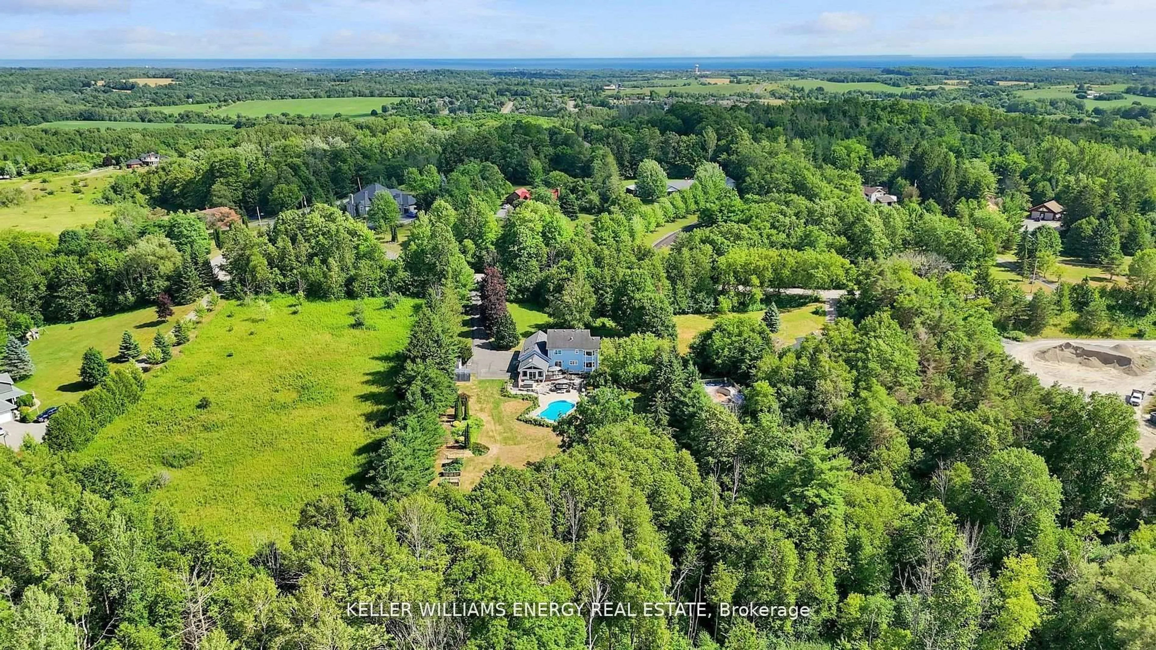 A pic from outside/outdoor area/front of a property/back of a property/a pic from drone, water/lake/river/ocean view for 8378 Majestic Hills Dr, Hamilton Township Ontario K9A 4J7