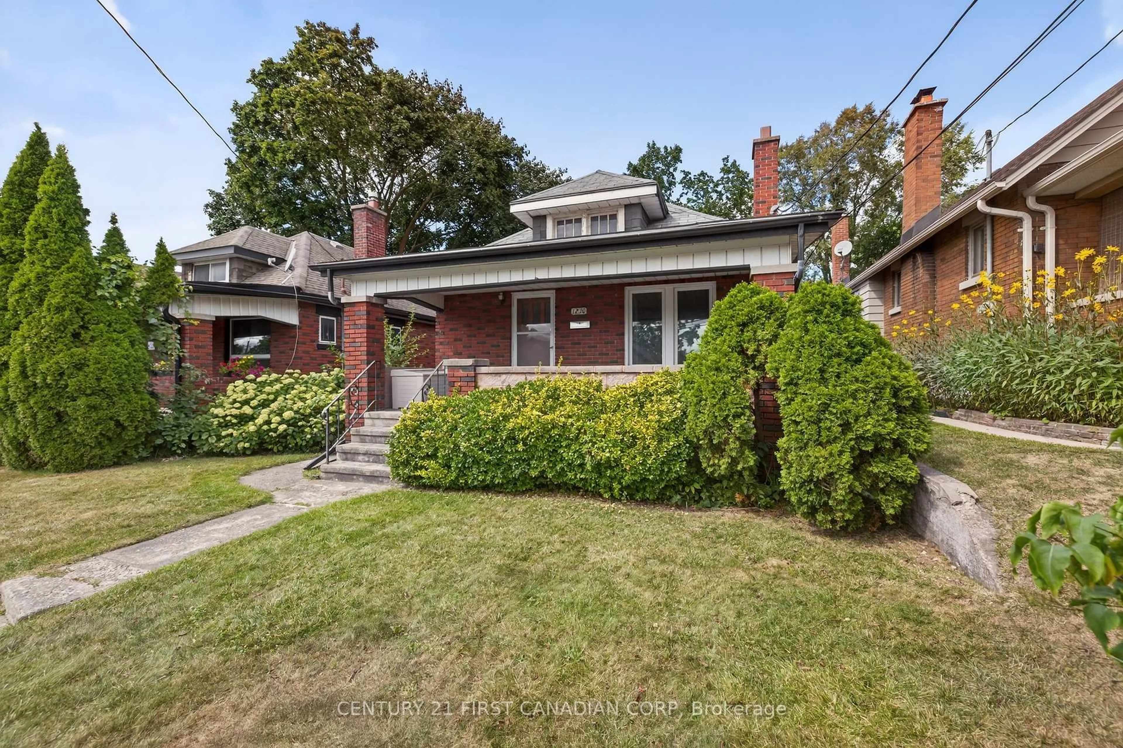 Home with brick exterior material, street for 1230 Dundas St, London East Ontario N5W 3B2