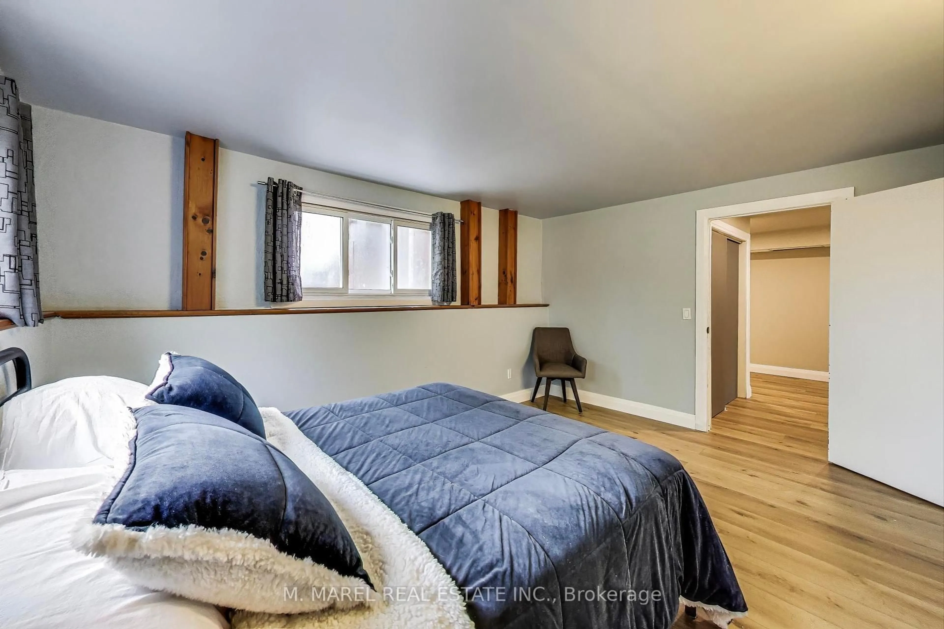 Bedroom with bed, wood/laminate floor for 9 Brooks Circ, West Lincoln Ontario L0R 2A0