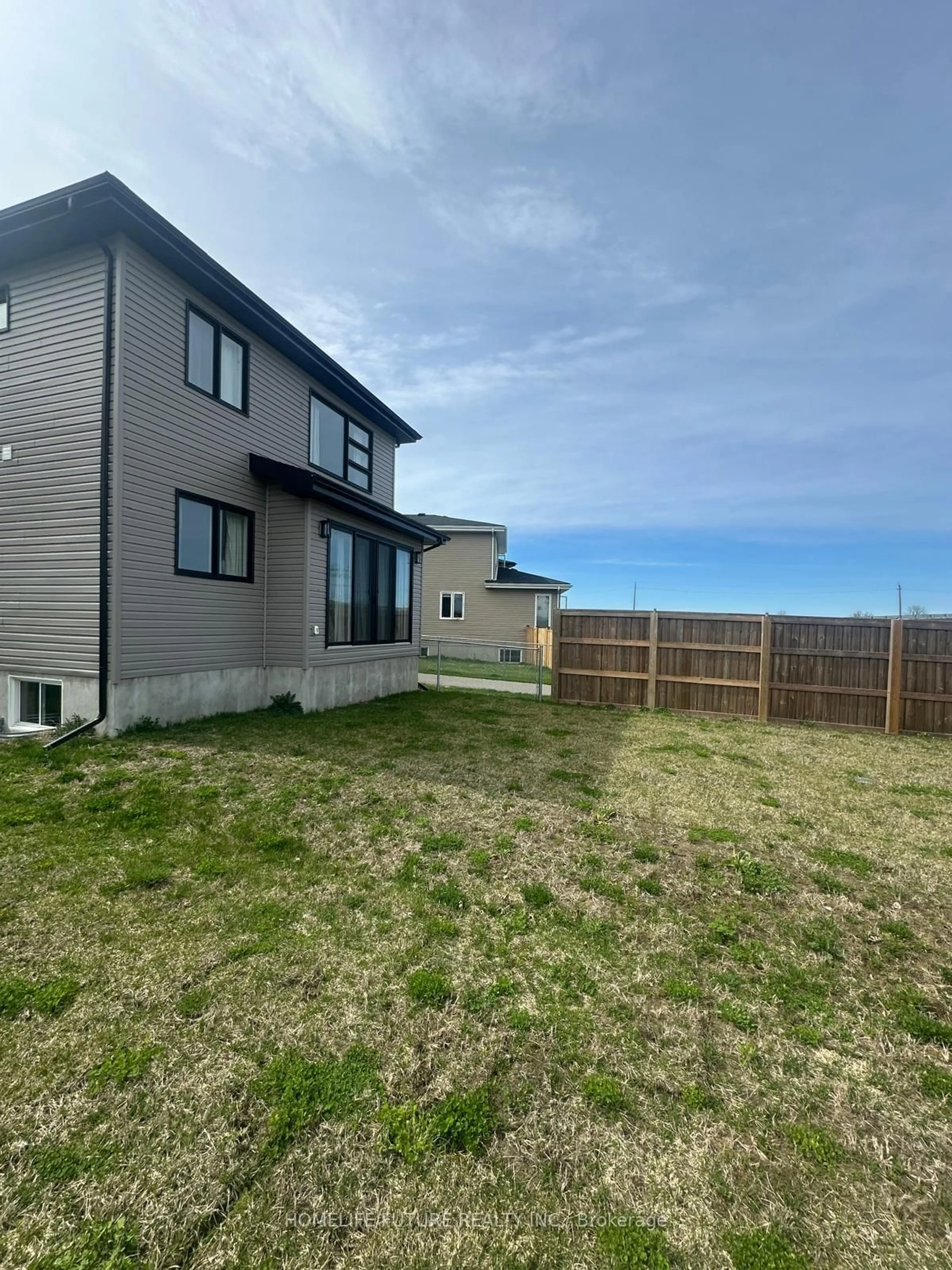 A pic from outside/outdoor area/front of a property/back of a property/a pic from drone, unknown for 51 Erie Crt, Loyalist Ontario K7N 0E3