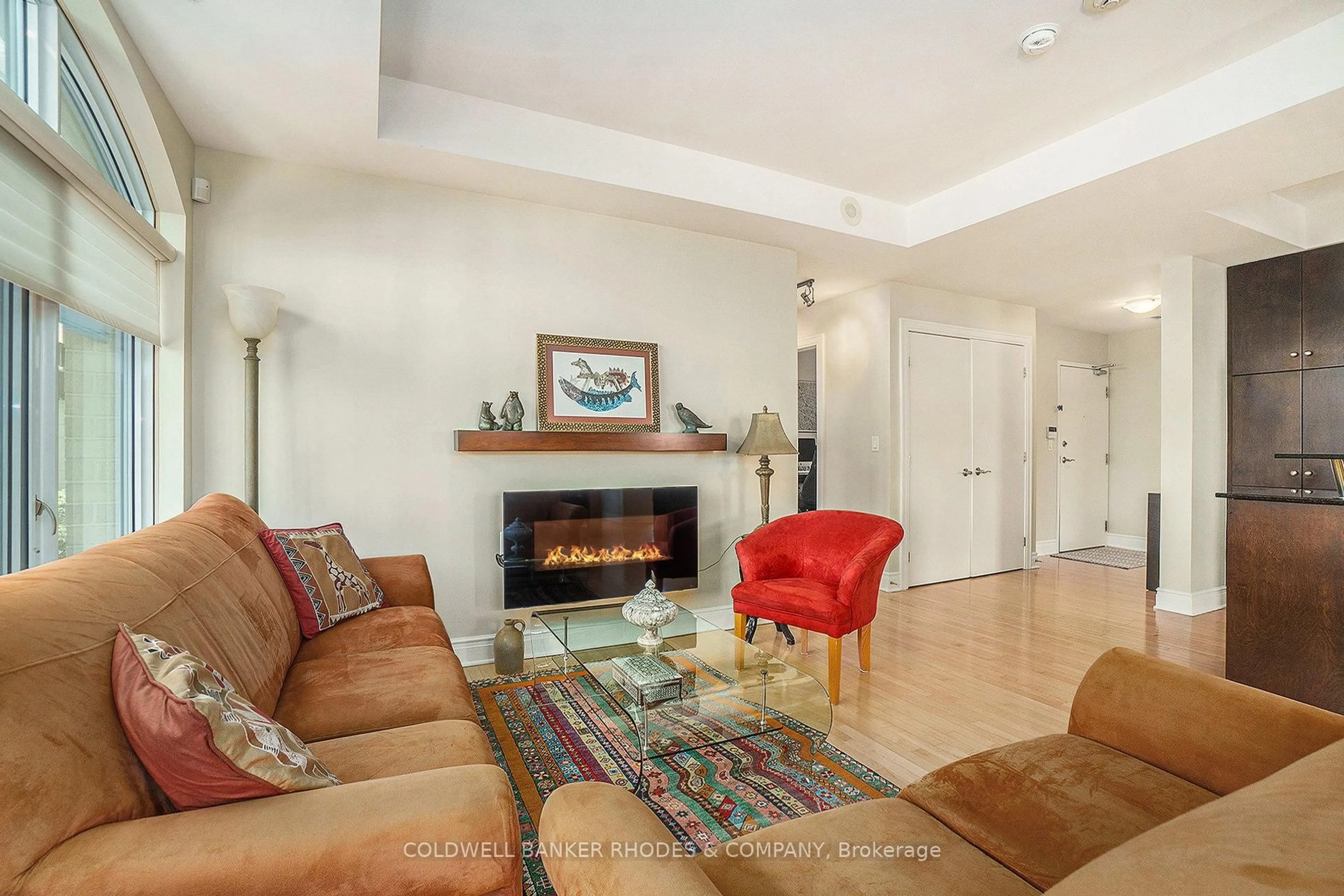 Living room with furniture, ceramic/tile floor for 95 Bronson Ave #401, Ottawa Ontario K1R 1E2