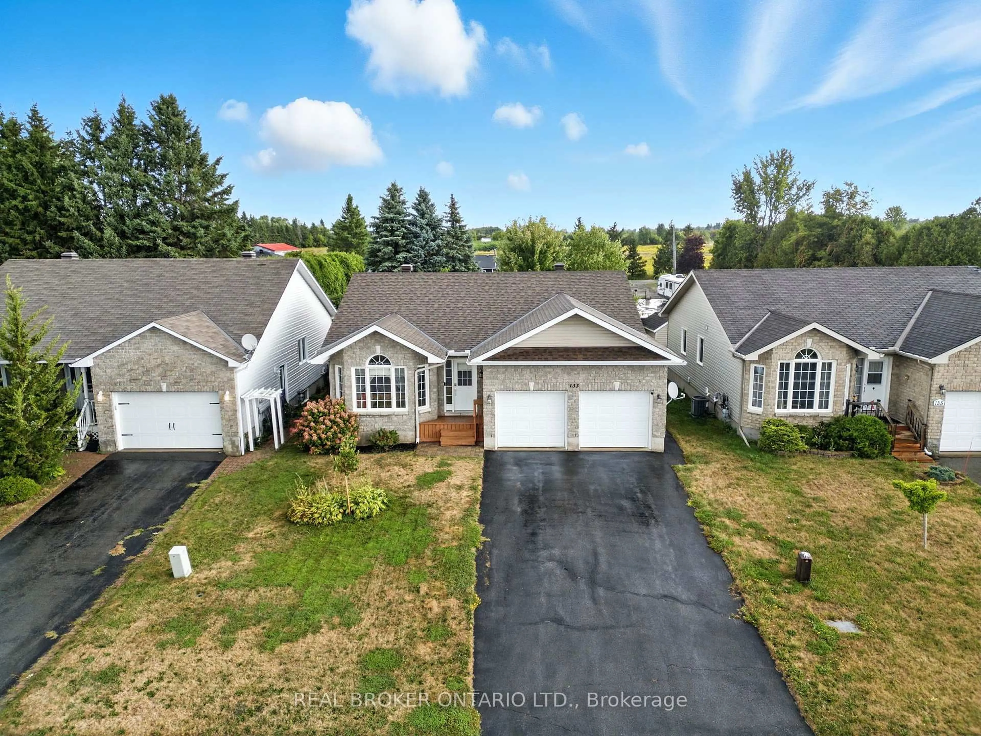 A pic from outside/outdoor area/front of a property/back of a property/a pic from drone, unknown for 133 Raina Way, North Grenville Ontario K0G 1J0