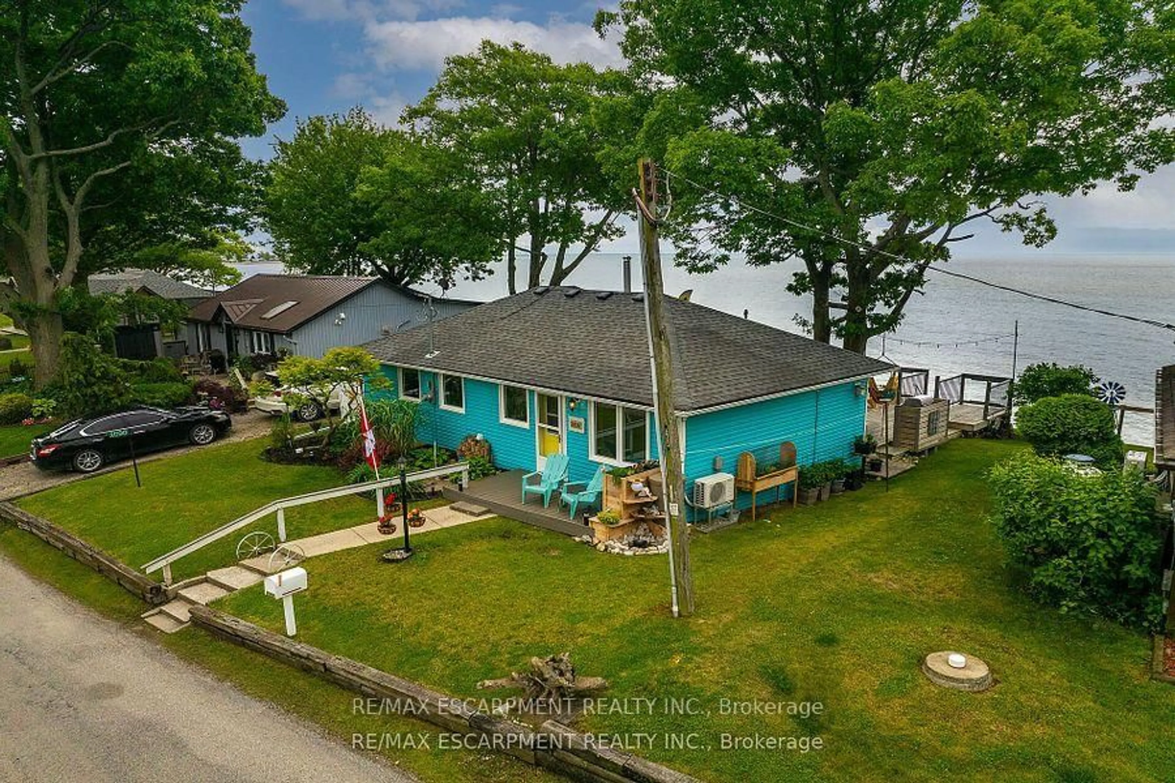 A pic from outside/outdoor area/front of a property/back of a property/a pic from drone, water/lake/river/ocean view for 2090 Lakeshore Rd, Haldimand Ontario N1A 2W8