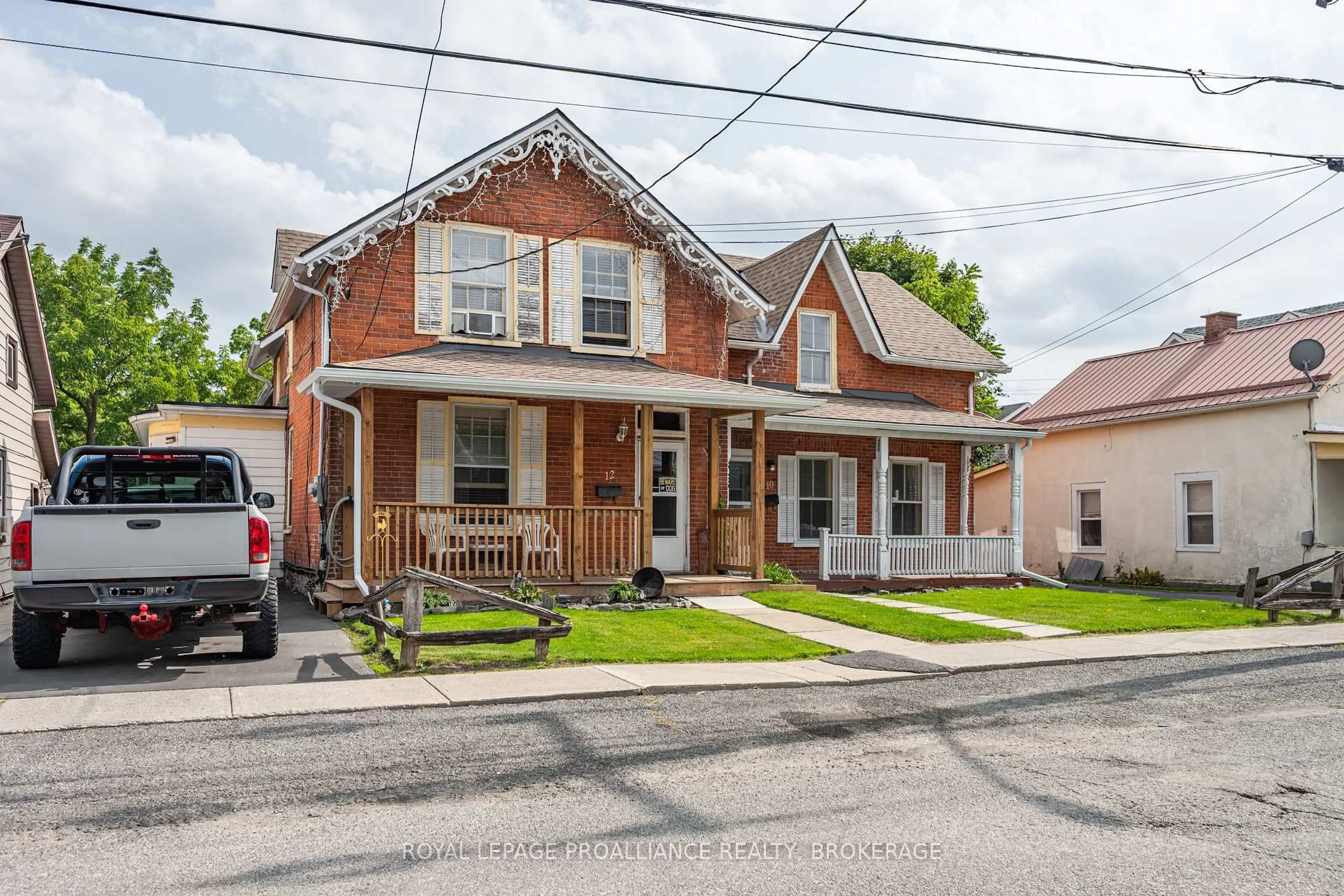 Home with brick exterior material, street for 10-12 Thomas St, Greater Napanee Ontario K7R 1K6
