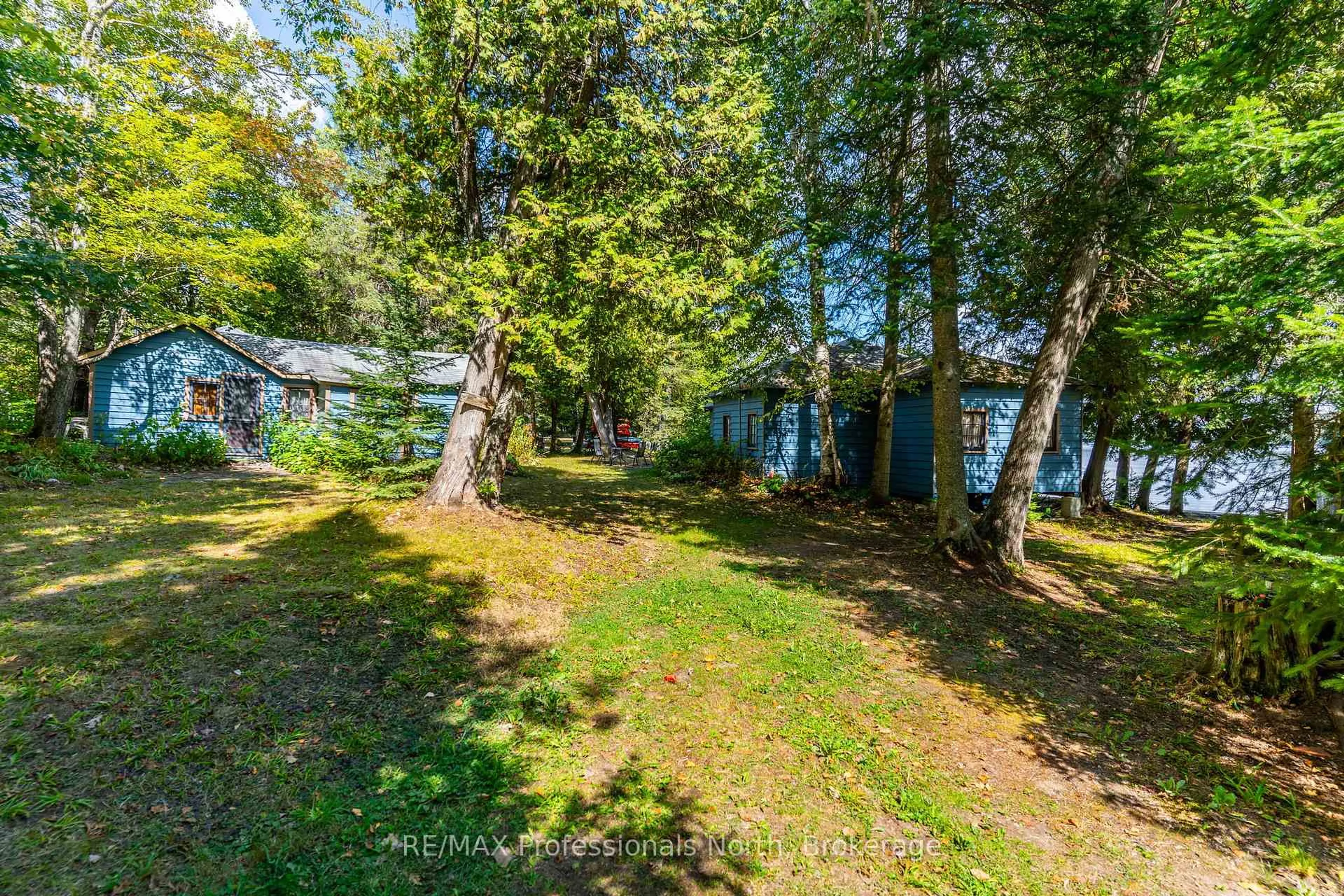 A pic from outside/outdoor area/front of a property/back of a property/a pic from drone, forest/trees view for 1468 Twelve Mile Lake Rd, Minden Hills Ontario K0M 2K0
