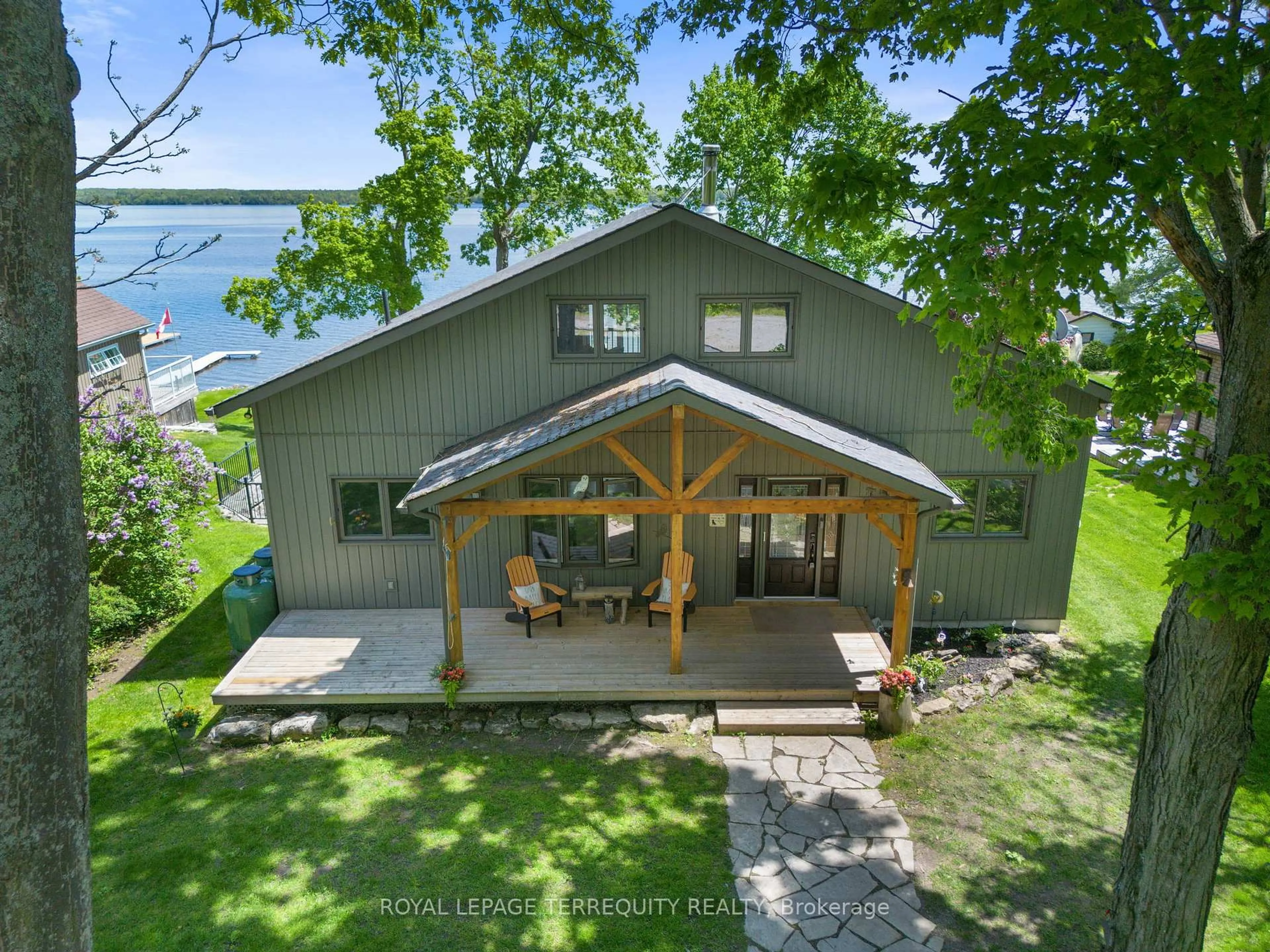 A pic from outside/outdoor area/front of a property/back of a property/a pic from drone, water/lake/river/ocean view for 18 Miller Rd, Kawartha Lakes Ontario K0M 1N0