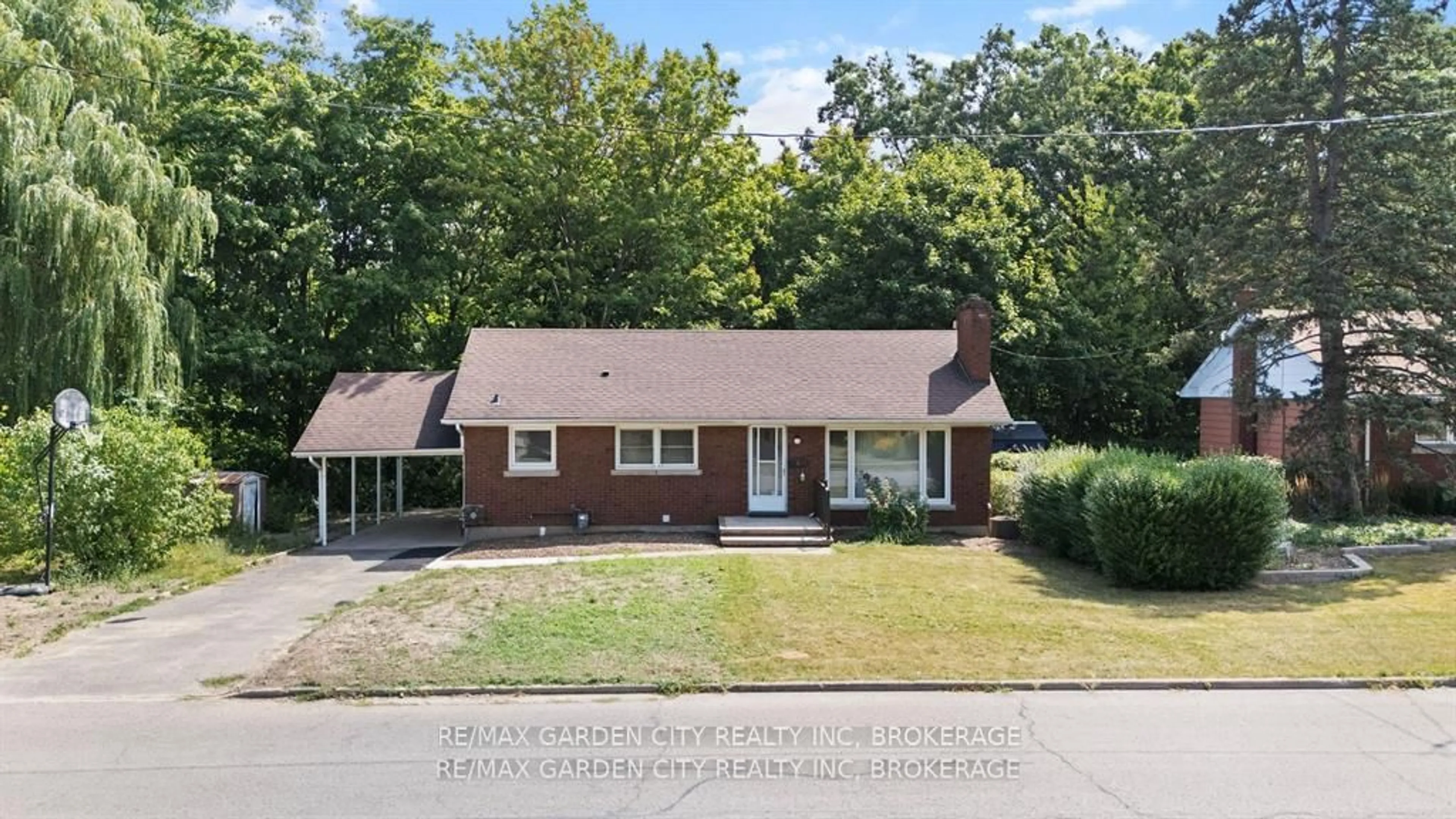 Home with brick exterior material, street for 1 Caroline St, St. Catharines Ontario L2T 3E9