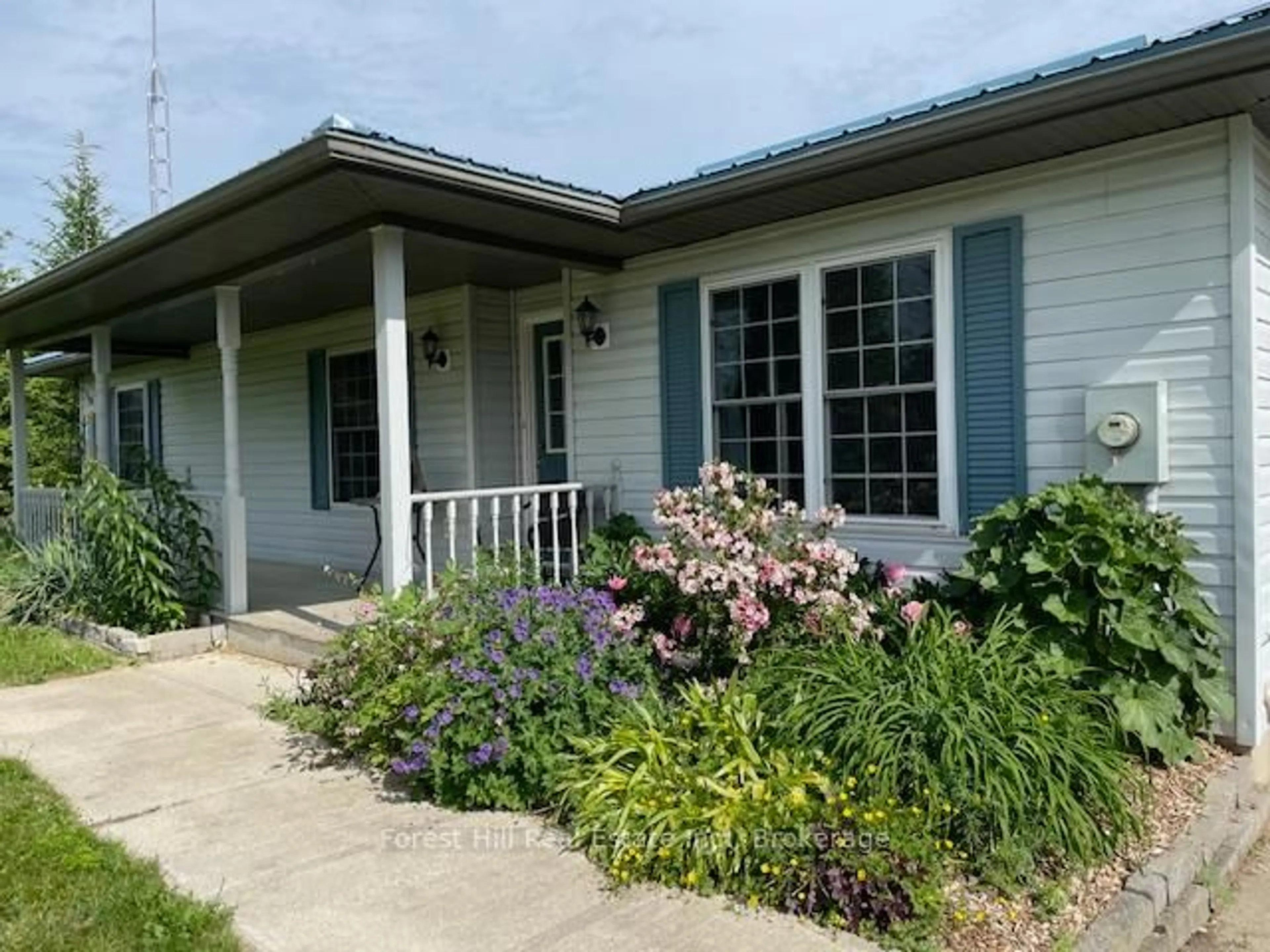 Home with vinyl exterior material, street for 504097 Grey Road 12, West Grey Ontario N0C 1H0