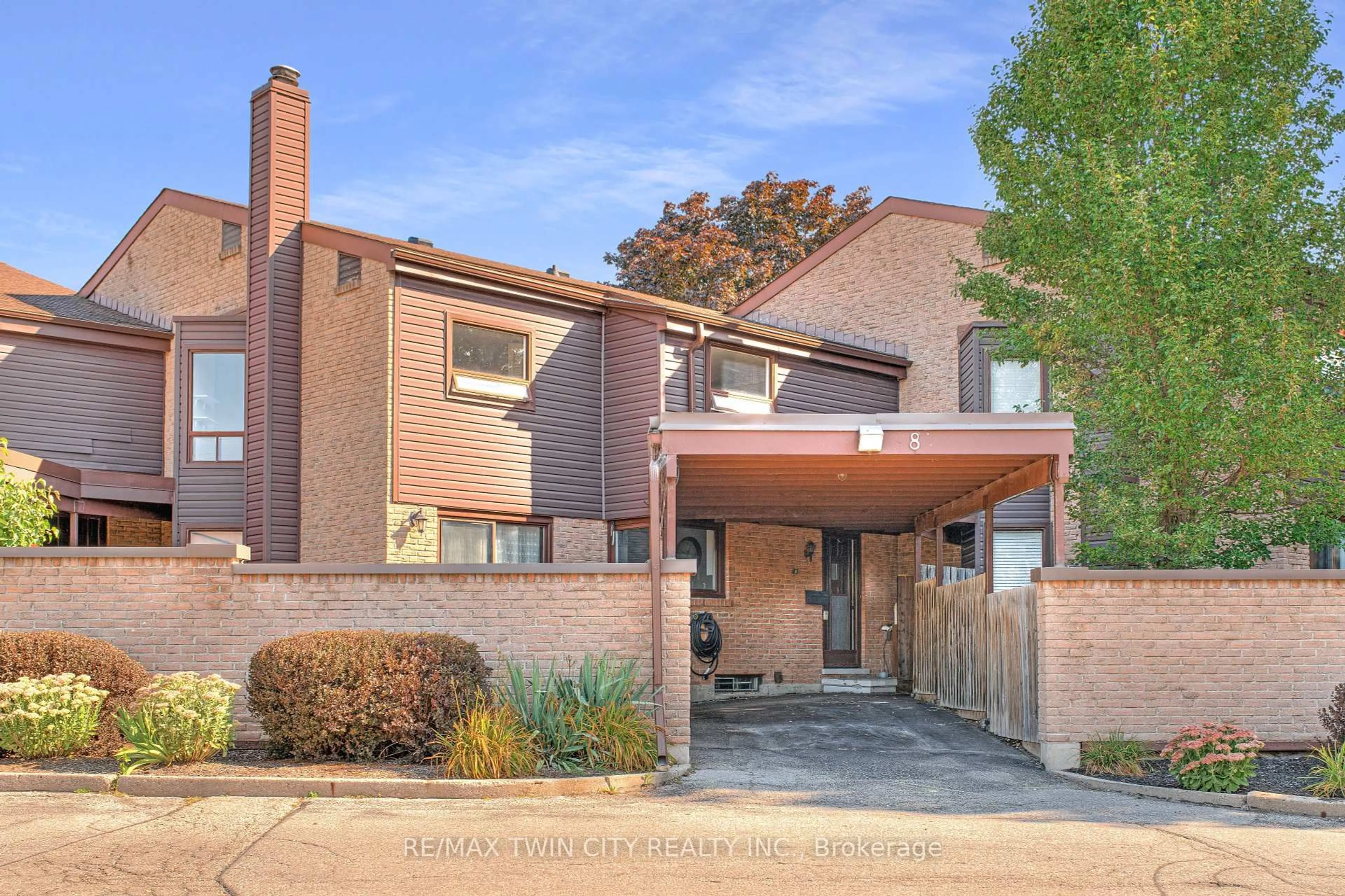 Home with brick exterior material, street for 28 Underhill Cres #8, Kitchener Ontario N2A 2S8
