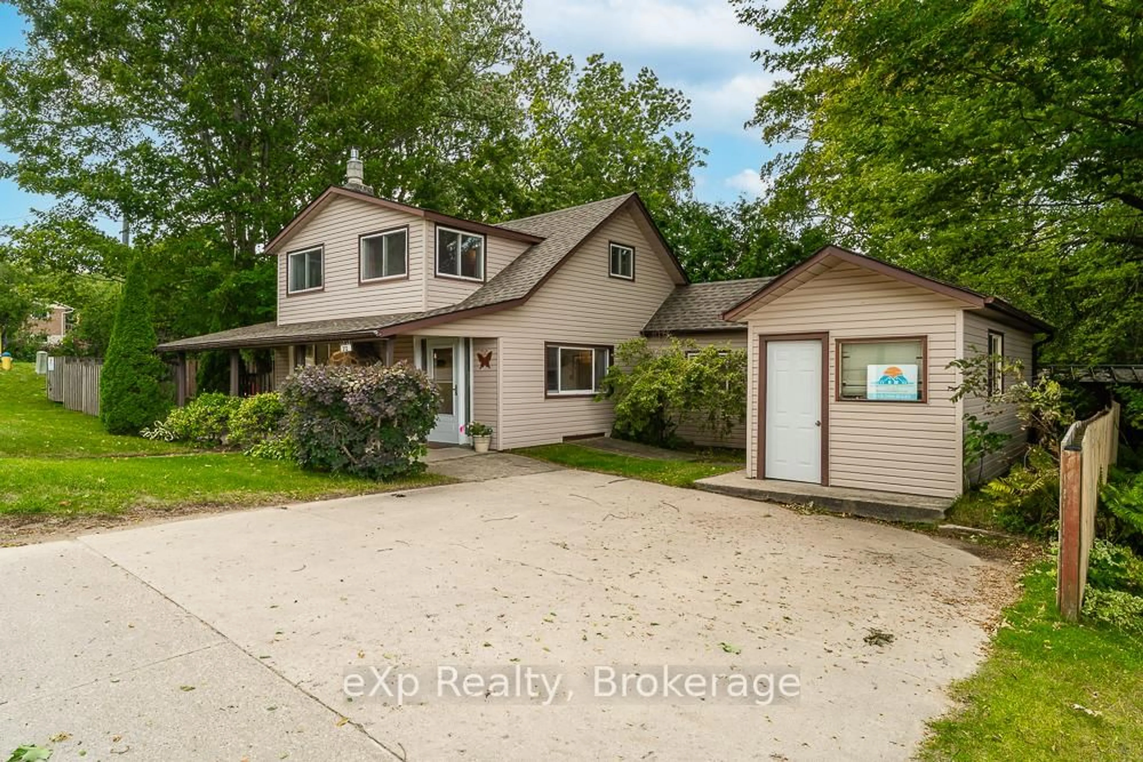 A pic from outside/outdoor area/front of a property/back of a property/a pic from drone, water/lake/river/ocean view for 212 Green St, Saugeen Shores Ontario N0H 2C0