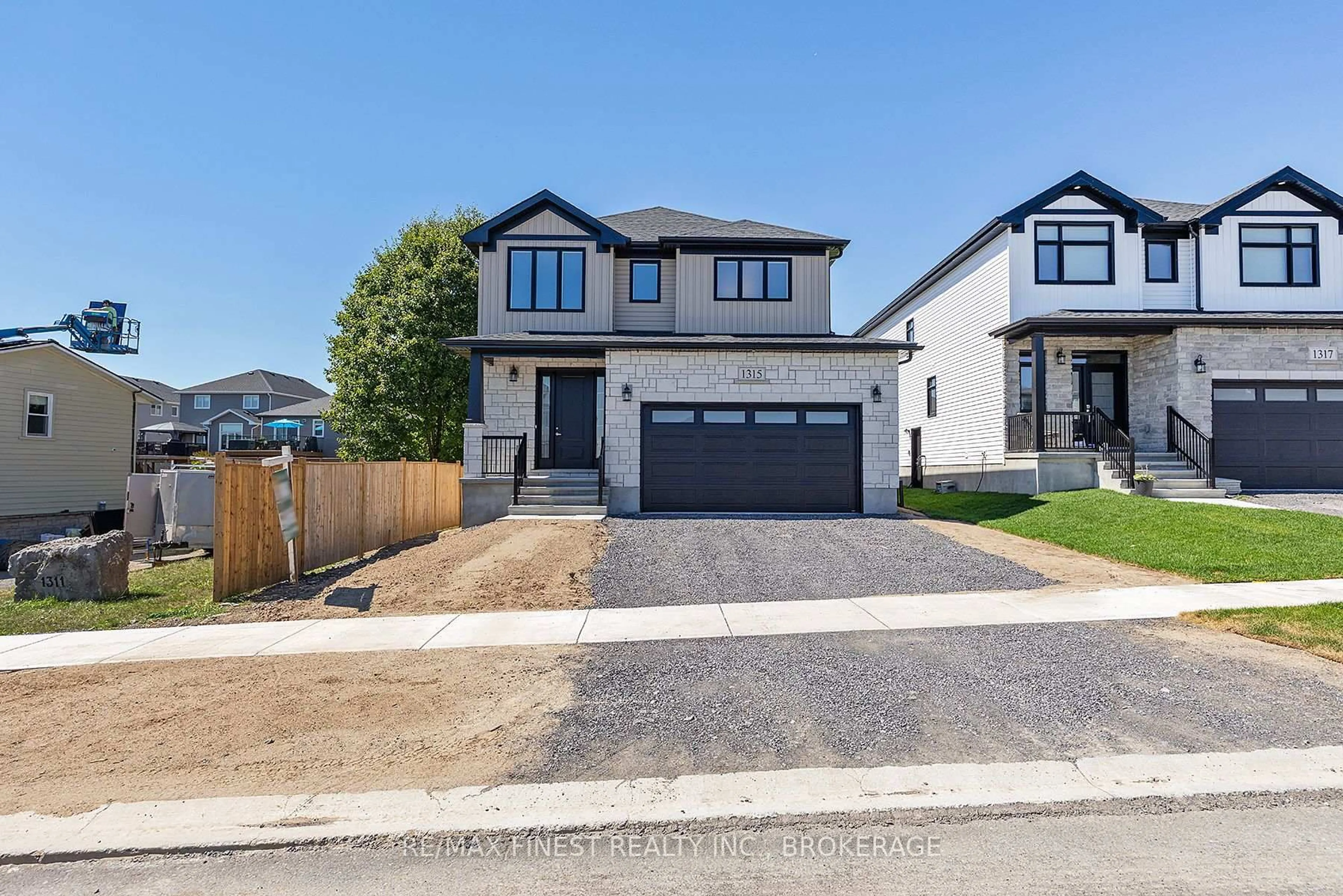 Home with brick exterior material, street for 1315 Turnbull Way, Kingston Ontario K7P 0T3