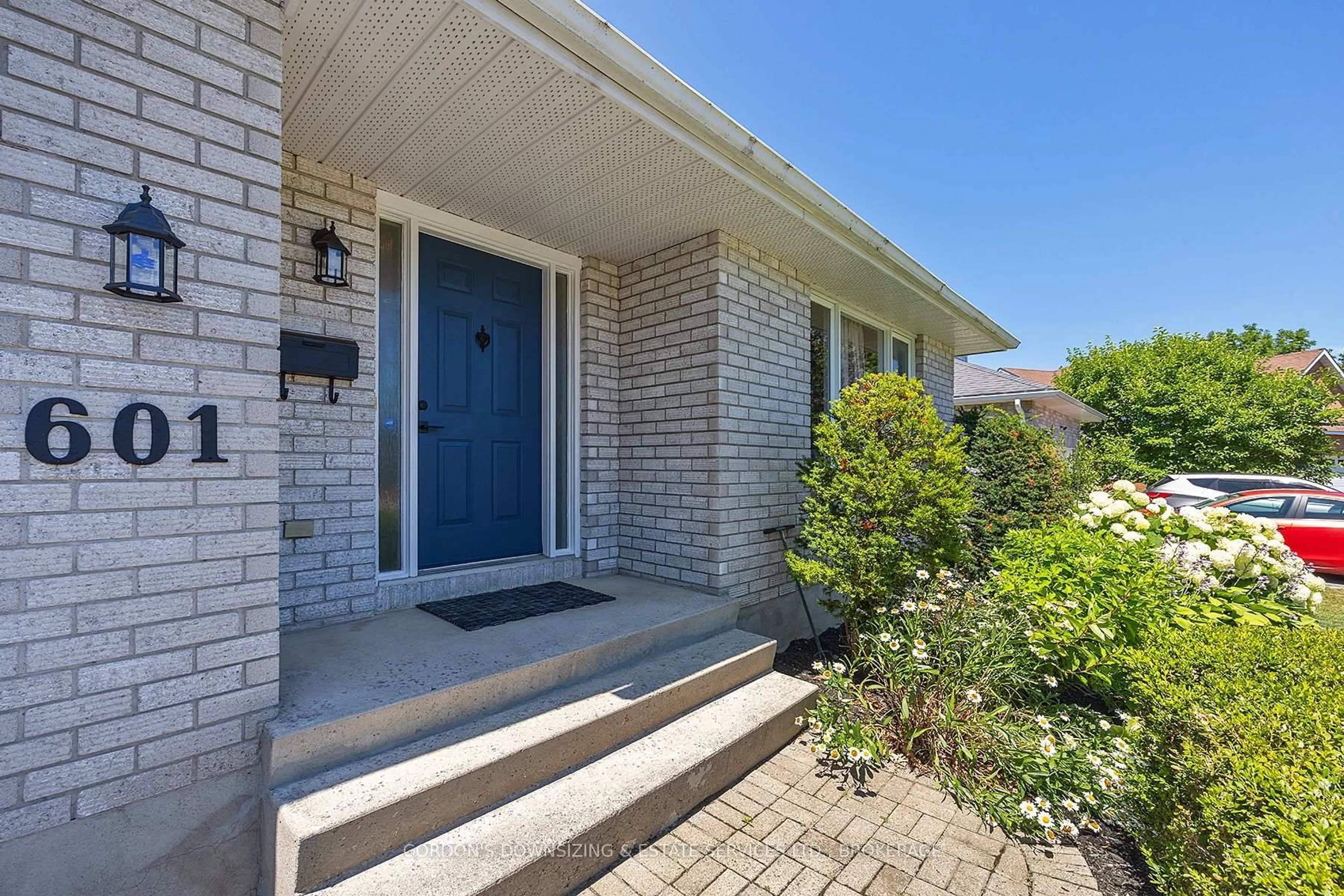 Home with brick exterior material, street for 601 Fernmoor Dr, Kingston Ontario K7M 8K5