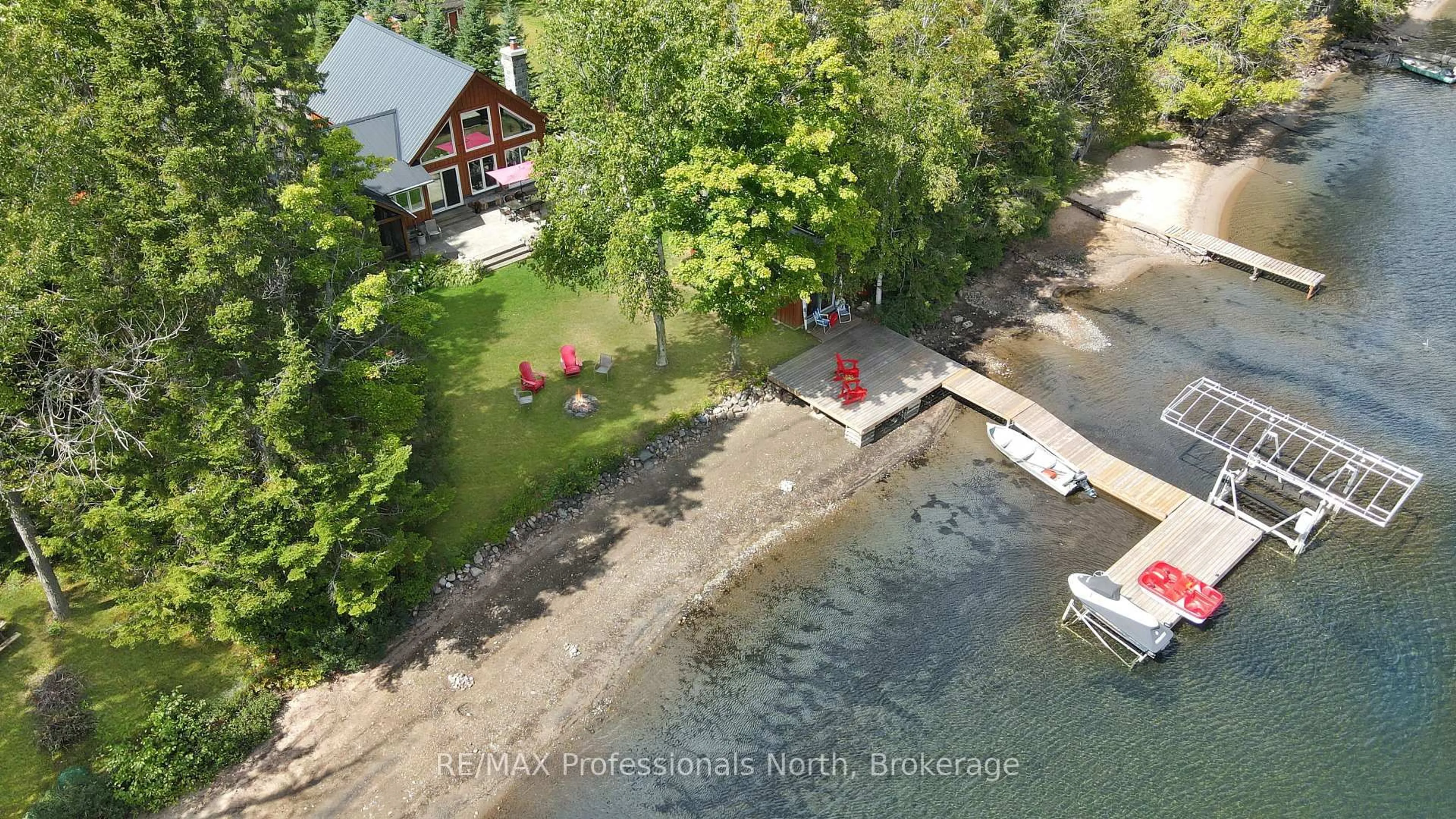 A pic from outside/outdoor area/front of a property/back of a property/a pic from drone, water/lake/river/ocean view for 1342 Twelve Mile Lake Rd, Minden Hills Ontario K0M 2K0