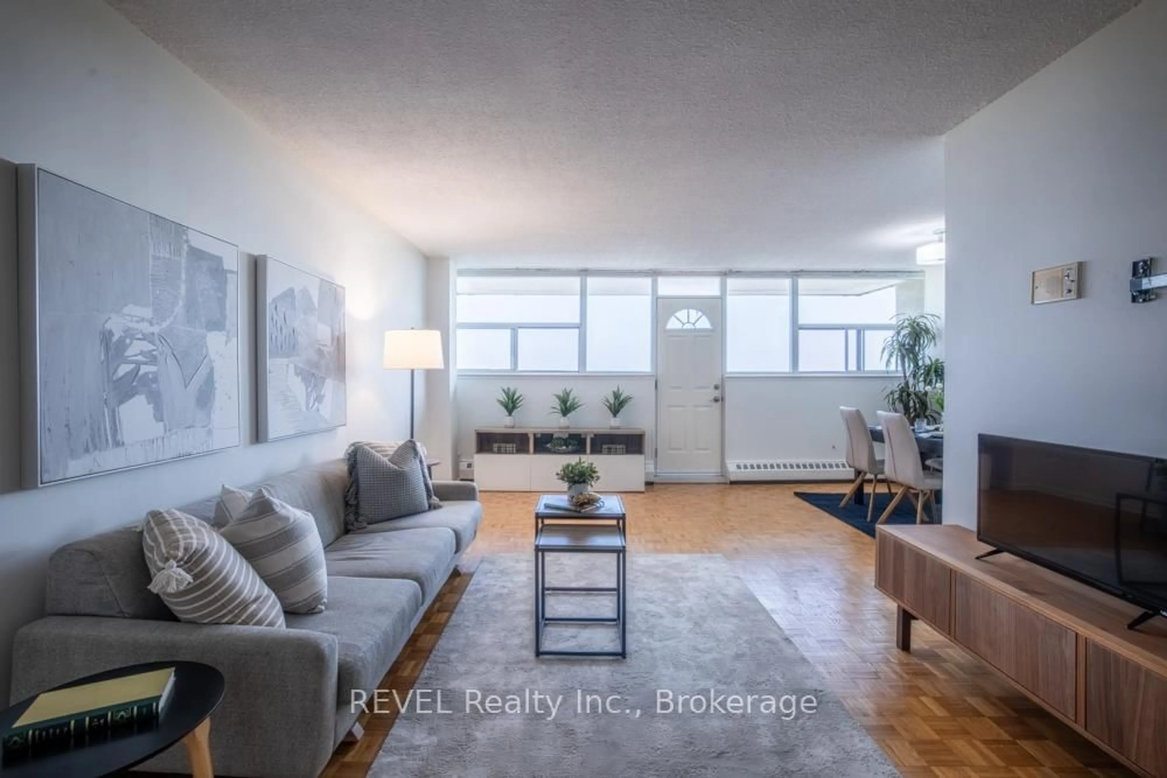 Living room with furniture, unknown for 215 Glenridge Ave #1104, St. Catharines Ontario L2T 3J7