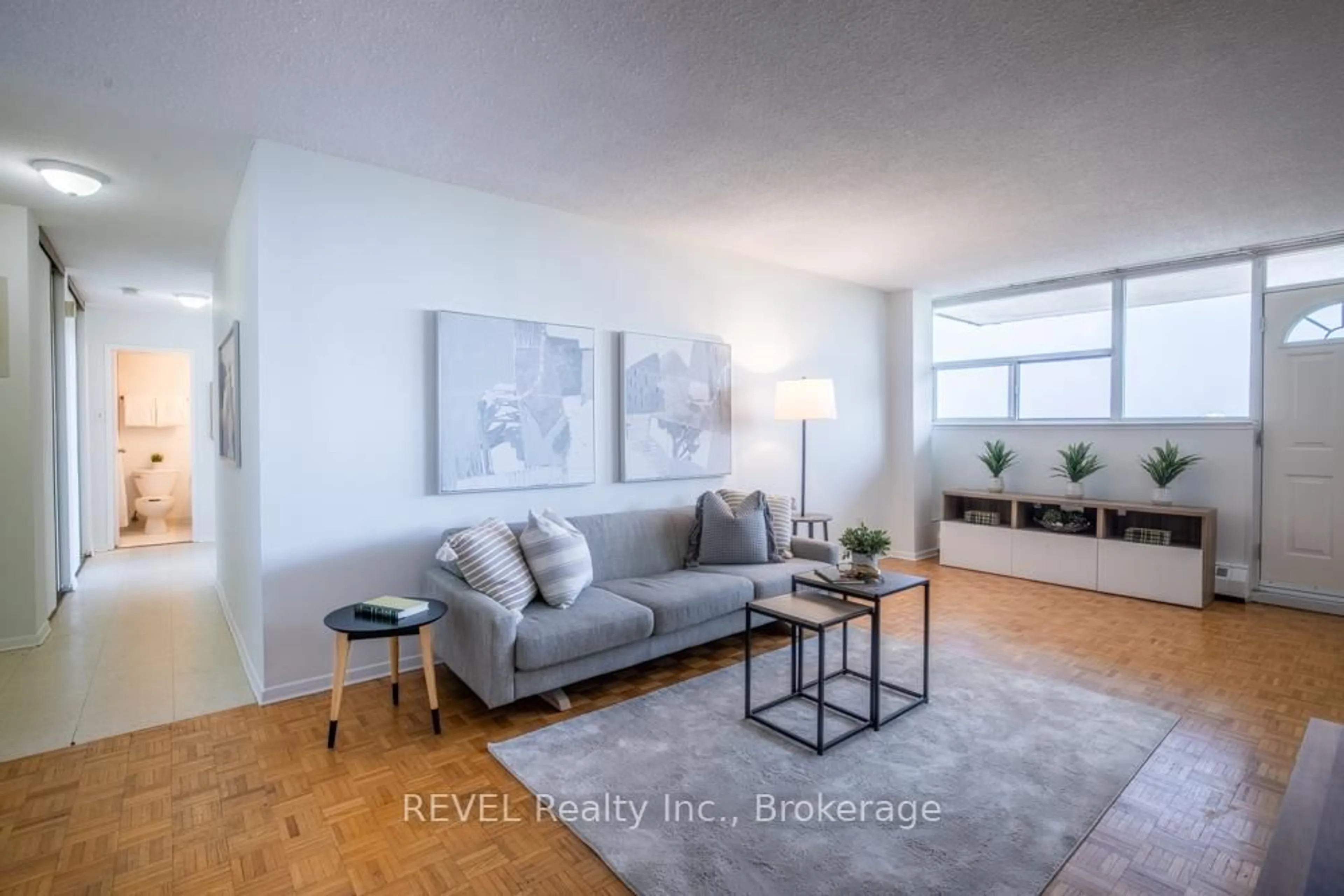 Living room with furniture, unknown for 215 Glenridge Ave #1104, St. Catharines Ontario L2T 3J7