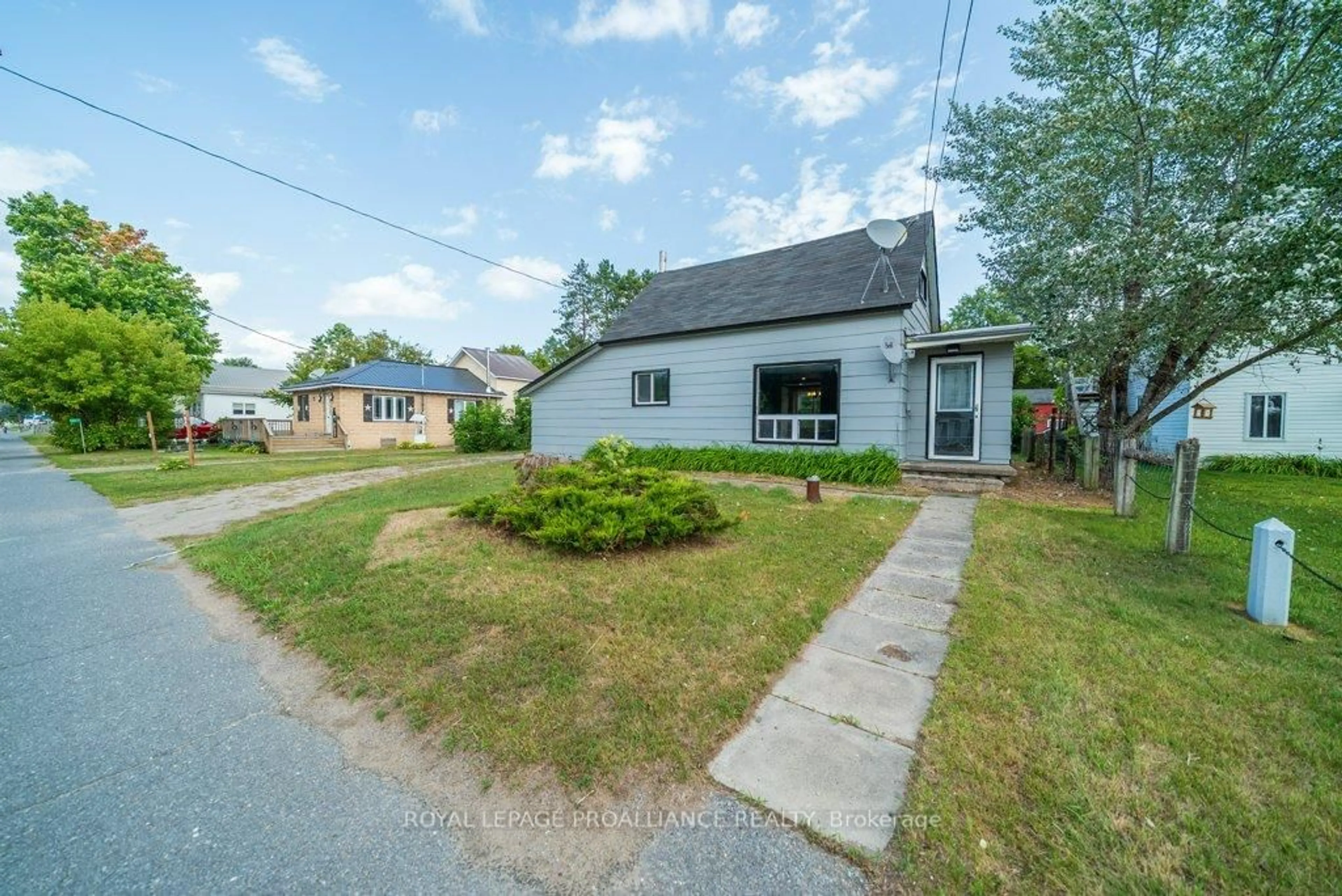 A pic from outside/outdoor area/front of a property/back of a property/a pic from drone, street for 12275 Highway 41, Addington Highlands Ontario K0H 2G0
