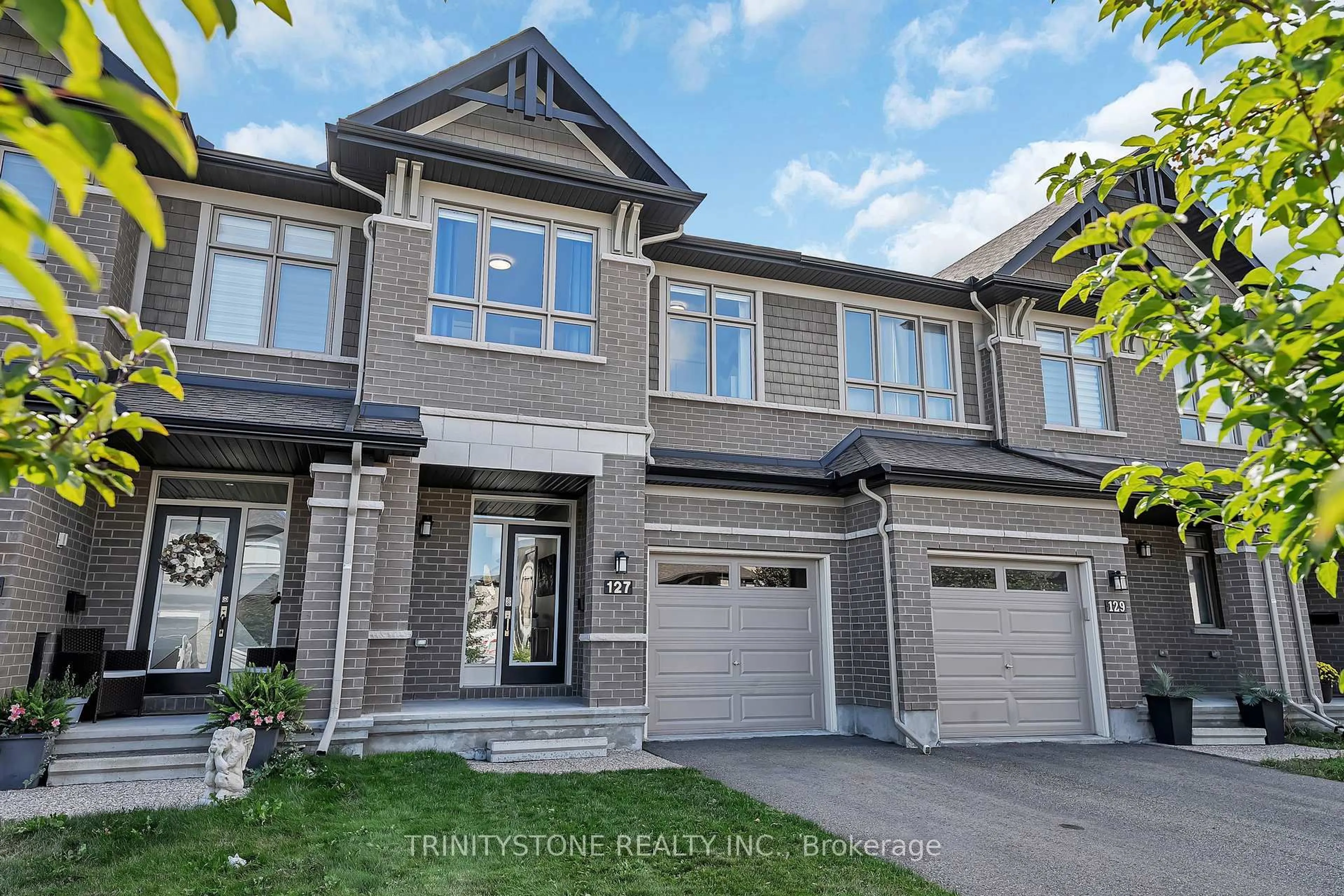 Home with brick exterior material, street for 127 Shinny Ave, Ottawa Ontario K2V 0G3