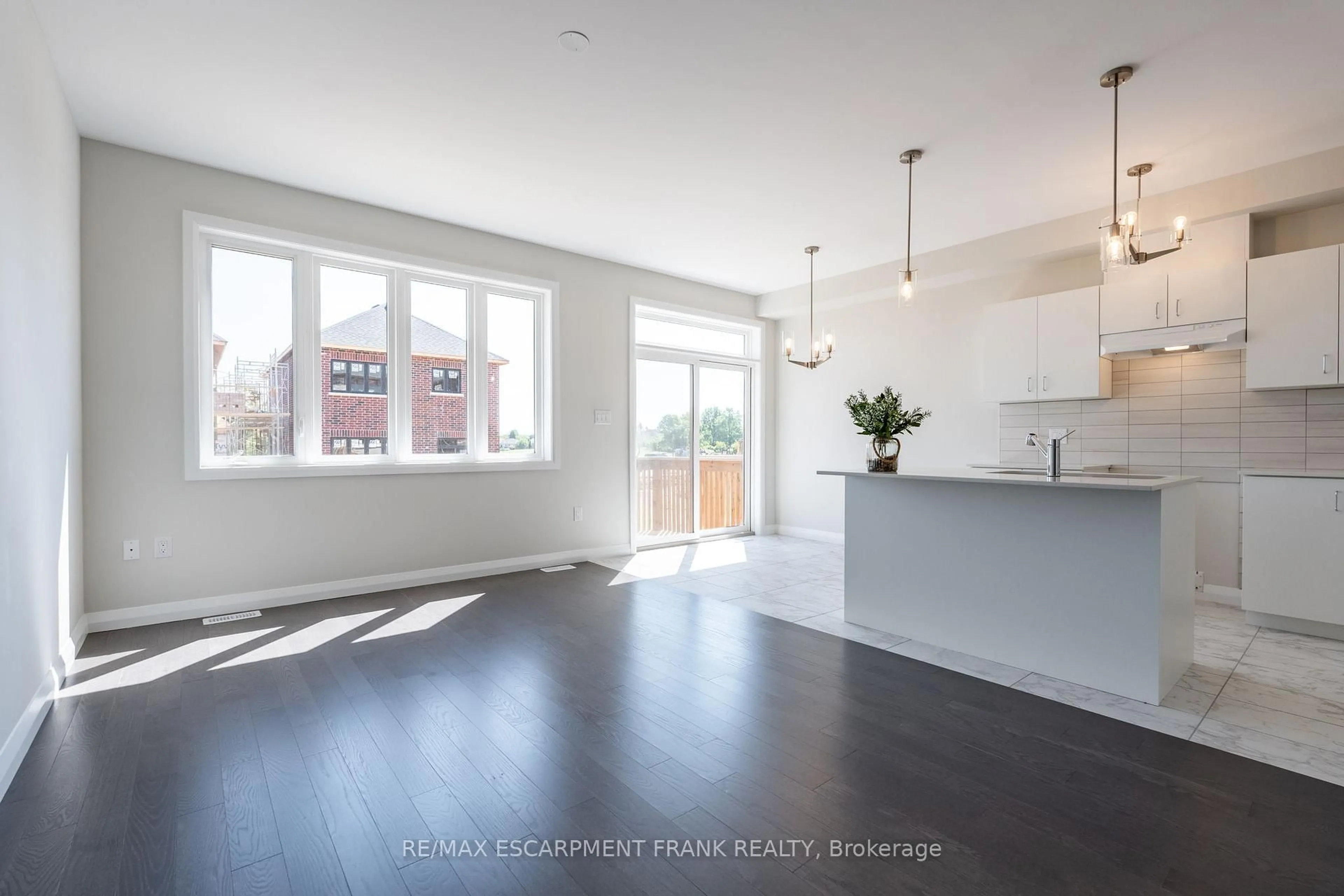 Open concept kitchen, wood/laminate floor for 5 CHERRY BLOSSOM Hts, Hamilton Ontario L9B 0E9
