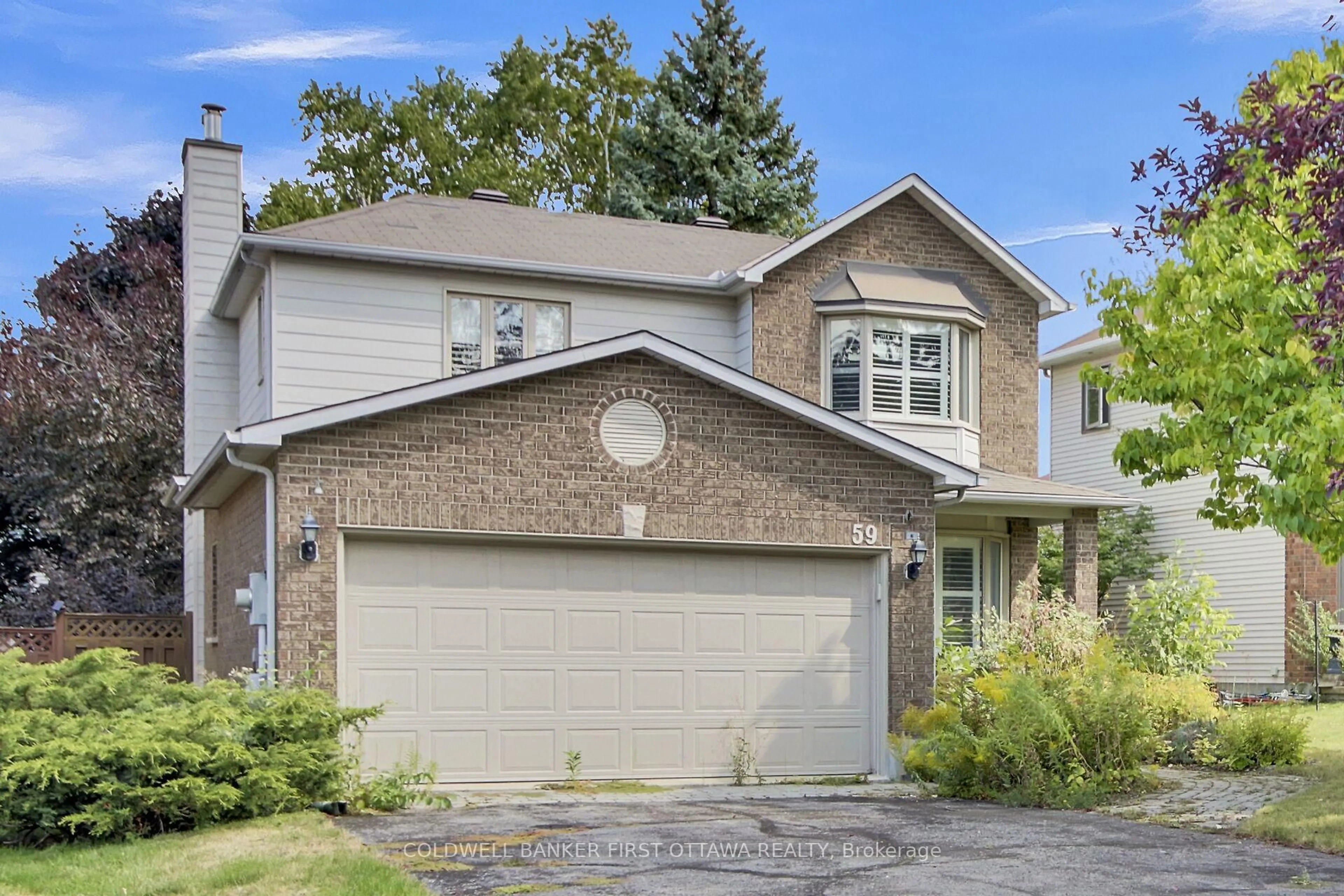 Home with vinyl exterior material, street for 59 Rowe Dr, Kanata Ontario K2L 3Y9