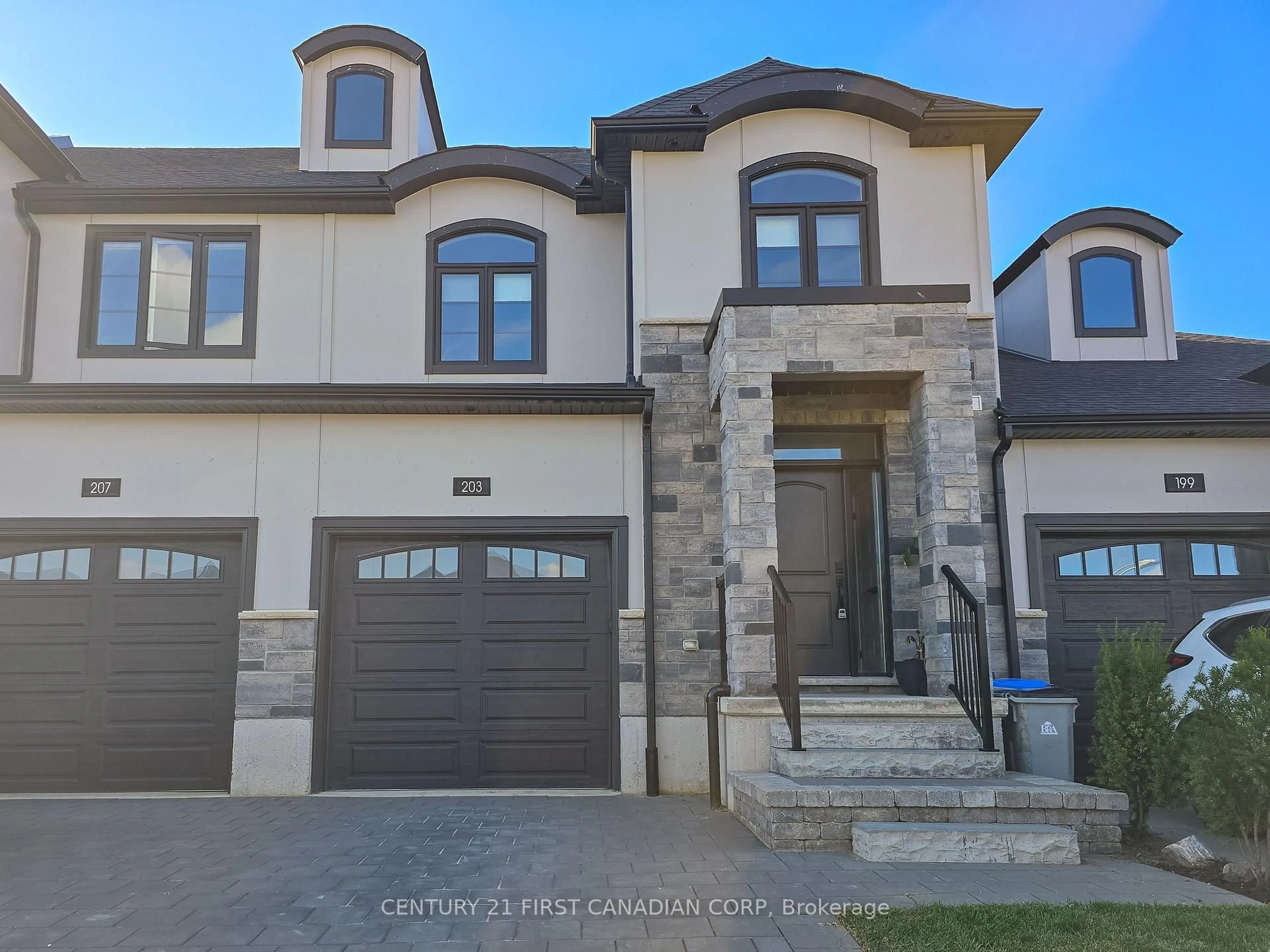 Home with brick exterior material, street for 203 Winlow Way, Middlesex Centre Ontario N0L 1R0