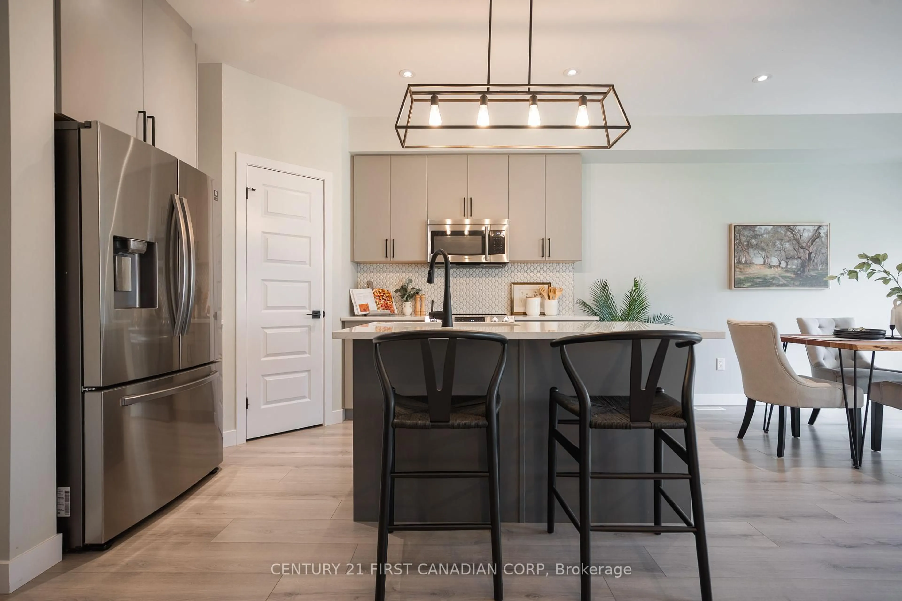 Open concept kitchen, unknown for 203 Winlow Way, Middlesex Centre Ontario N0L 1R0