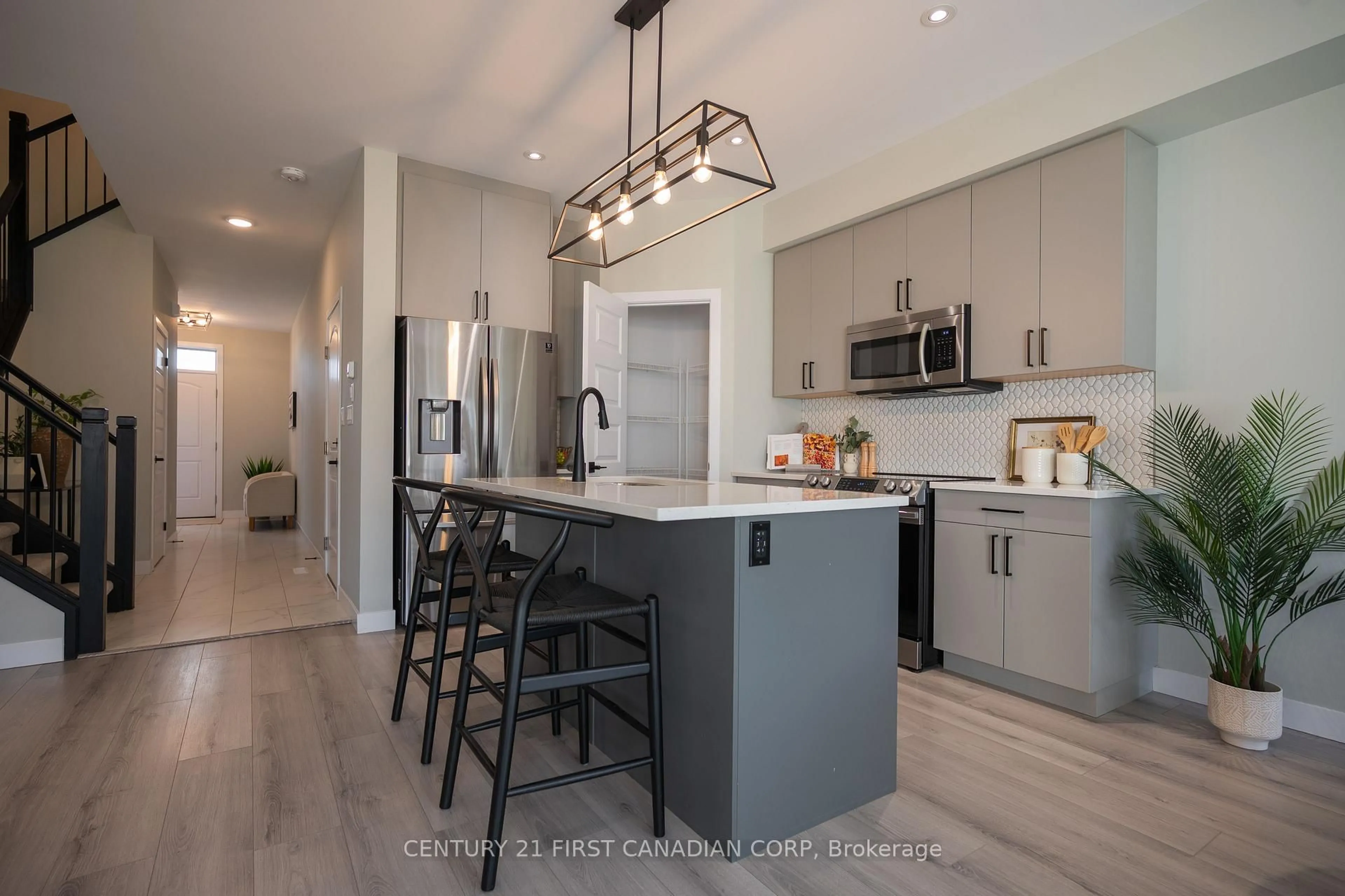 Open concept kitchen, unknown for 203 Winlow Way, Middlesex Centre Ontario N0L 1R0