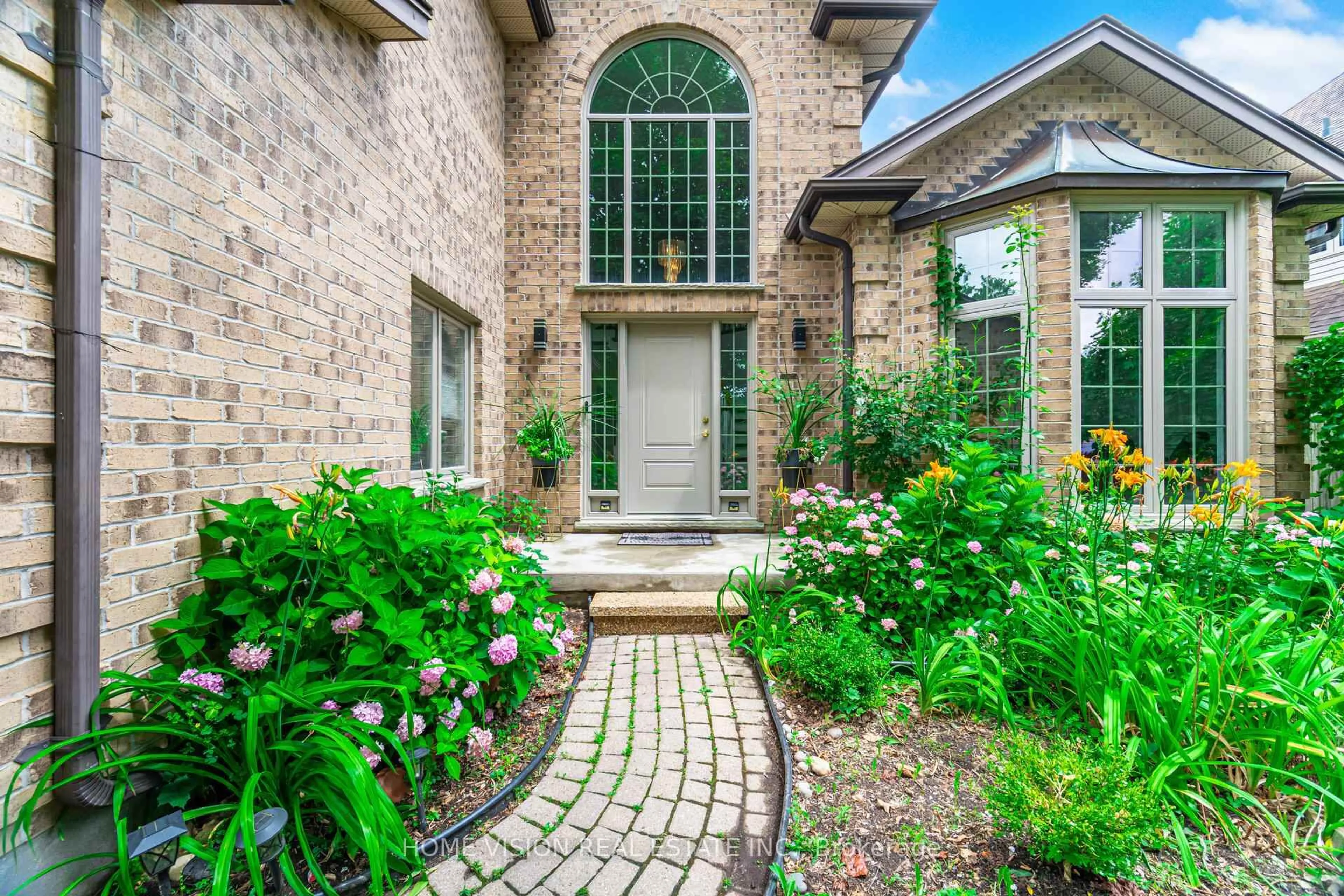 Home with brick exterior material, street for 14 Wintergarden Rd, London East Ontario N5Y 5M2