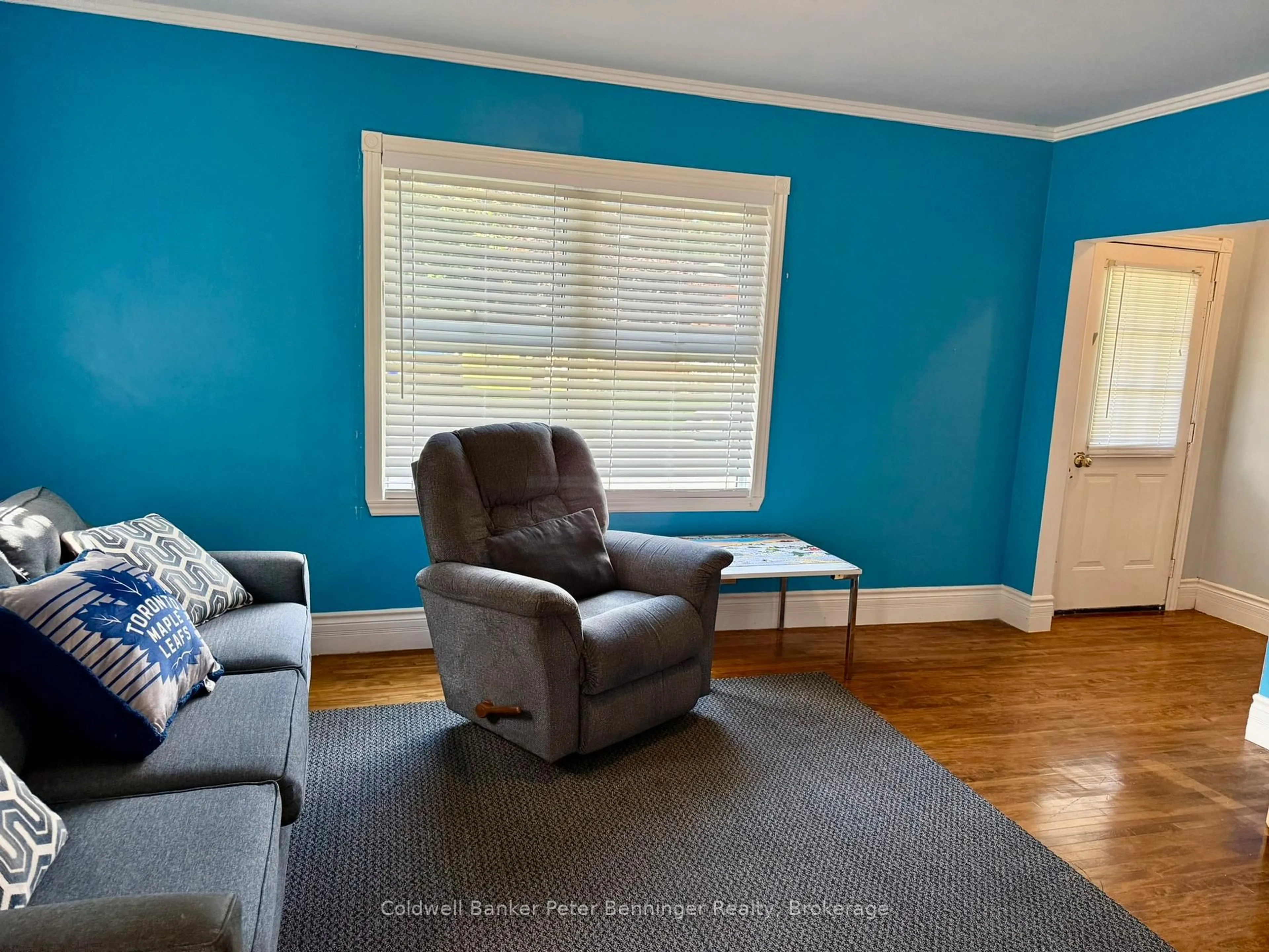 Living room with furniture, wood/laminate floor for 259 Minnie St, North Huron Ontario N0G 2W0