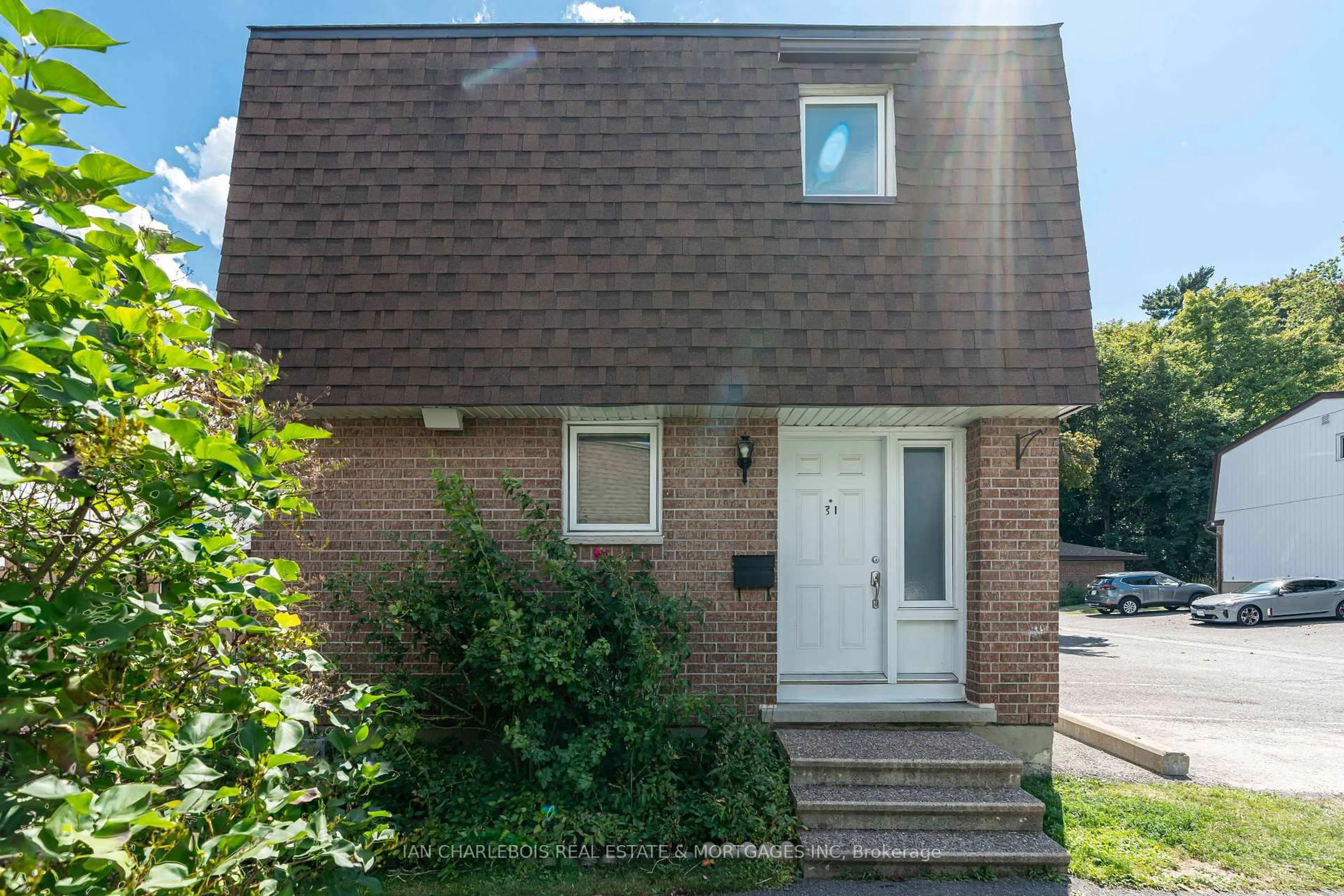 Home with brick exterior material, street for 837 Eastvale Dr #31, Ottawa Ontario K1J 7T5