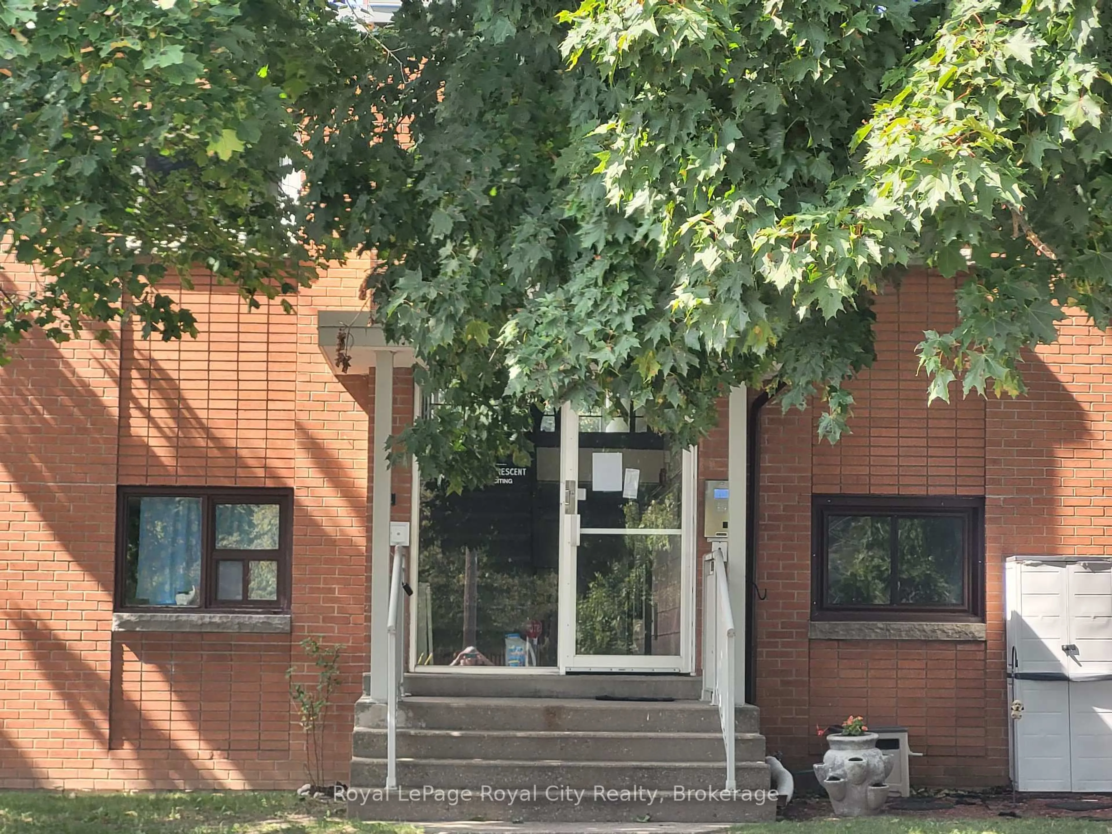Home with brick exterior material, street for 1 Sunnylea Cres #107, Guelph Ontario N1E 1W1