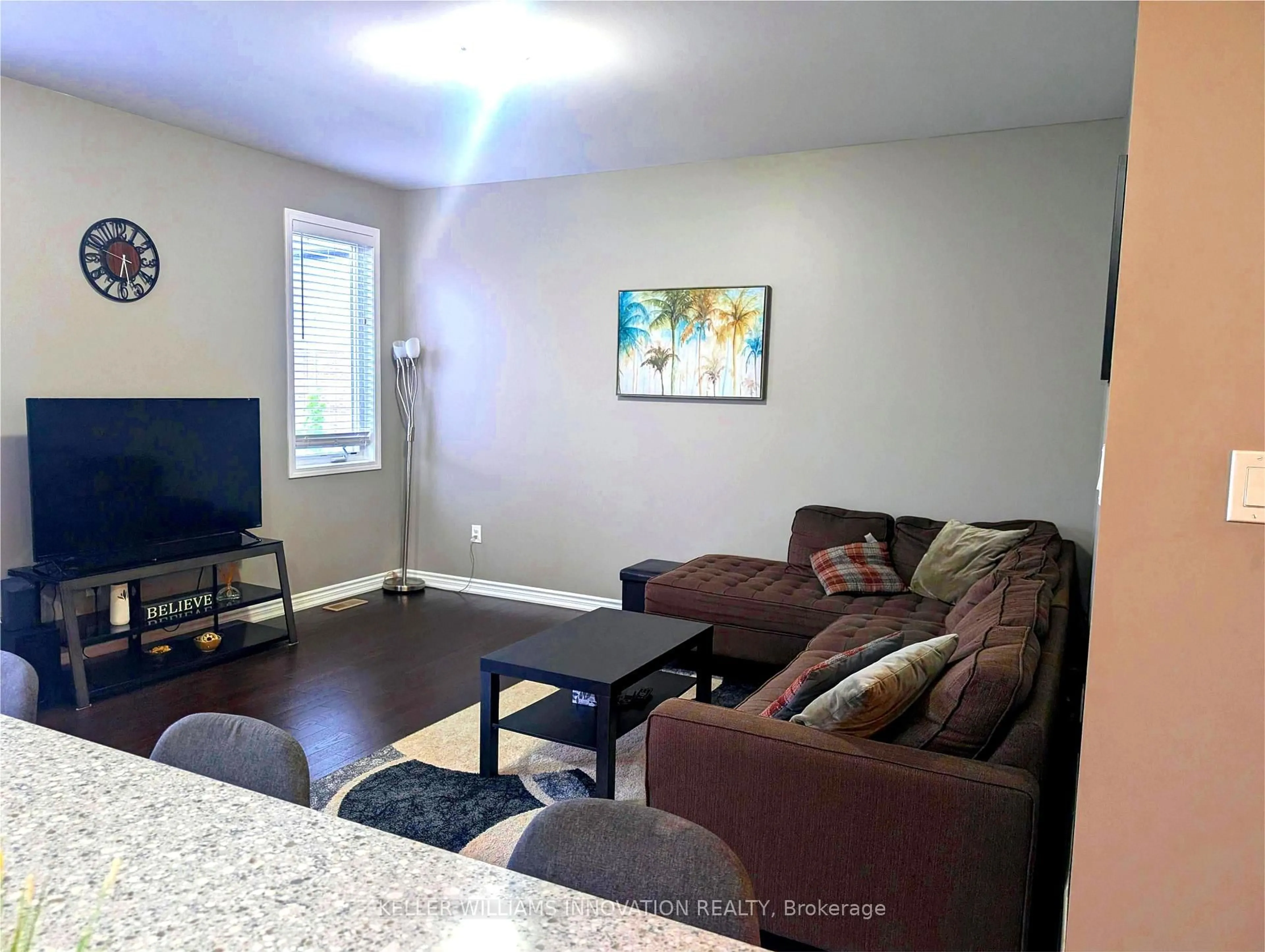 Living room with furniture, unknown for 44 Postmaster Dr, Kitchener Ontario N2R 0J2