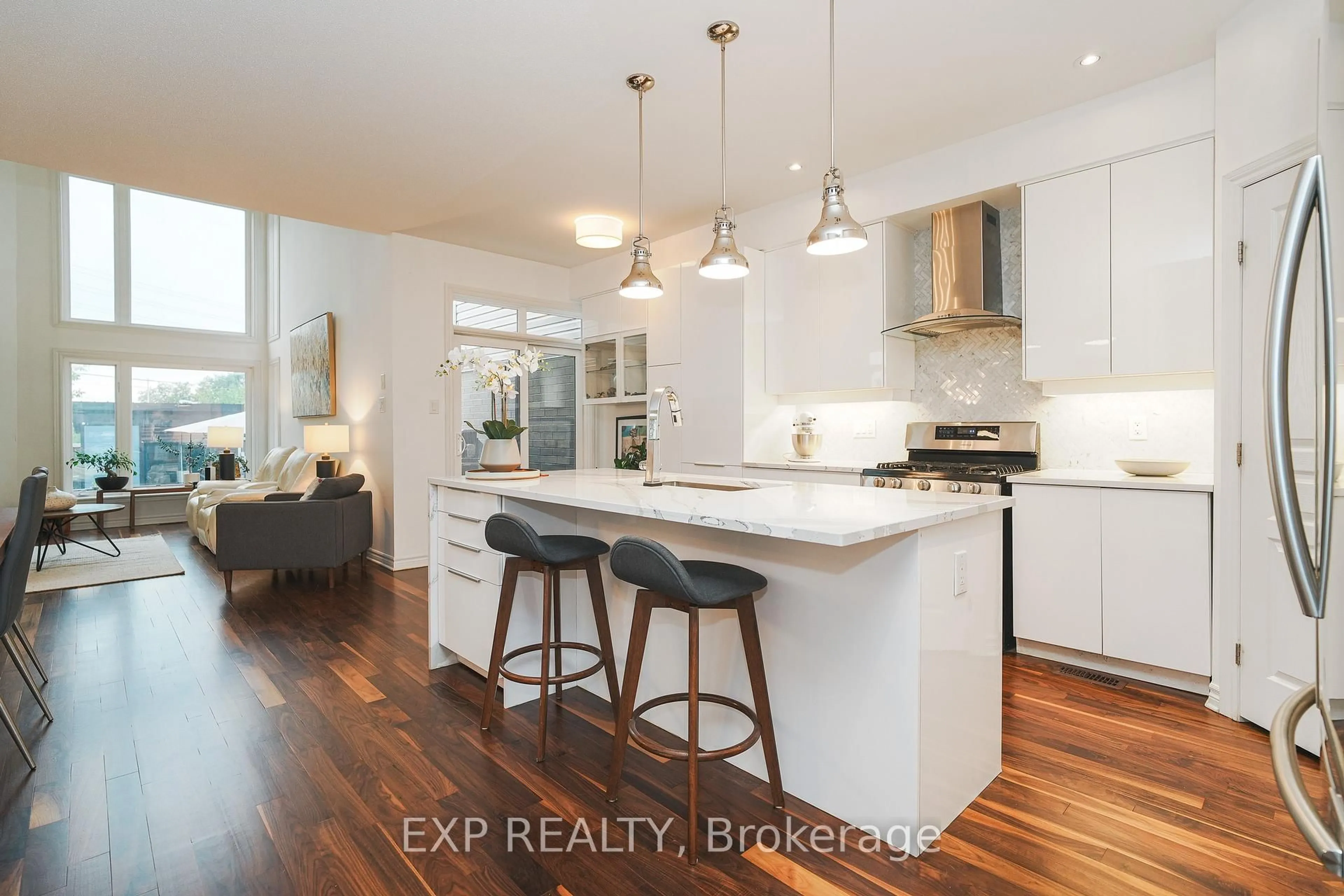 Open concept kitchen, wood/laminate floor for 180 Mattingly Way, Ottawa Ontario K4M 0C4