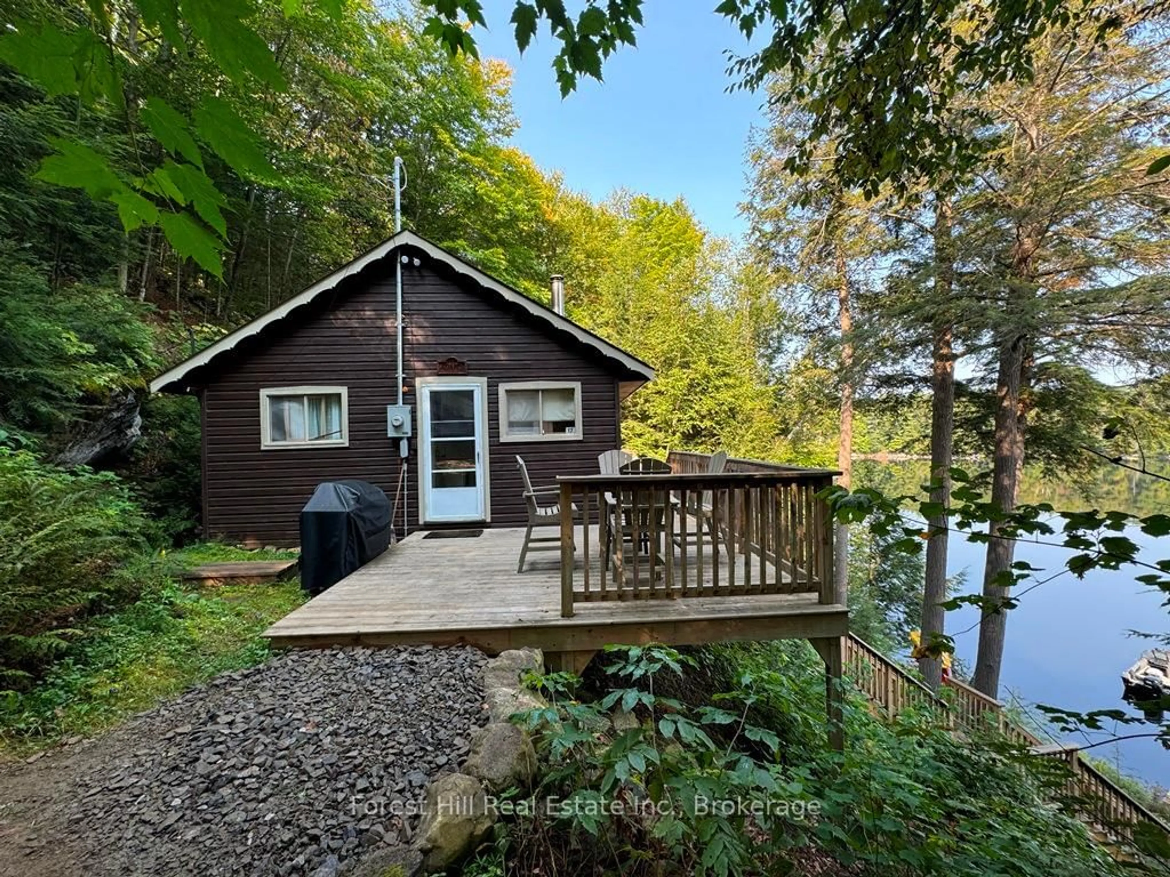 A pic from outside/outdoor area/front of a property/back of a property/a pic from drone, water/lake/river/ocean view for 1023 Twilight Close Lane, Algonquin Highlands Ontario P0A 1E0