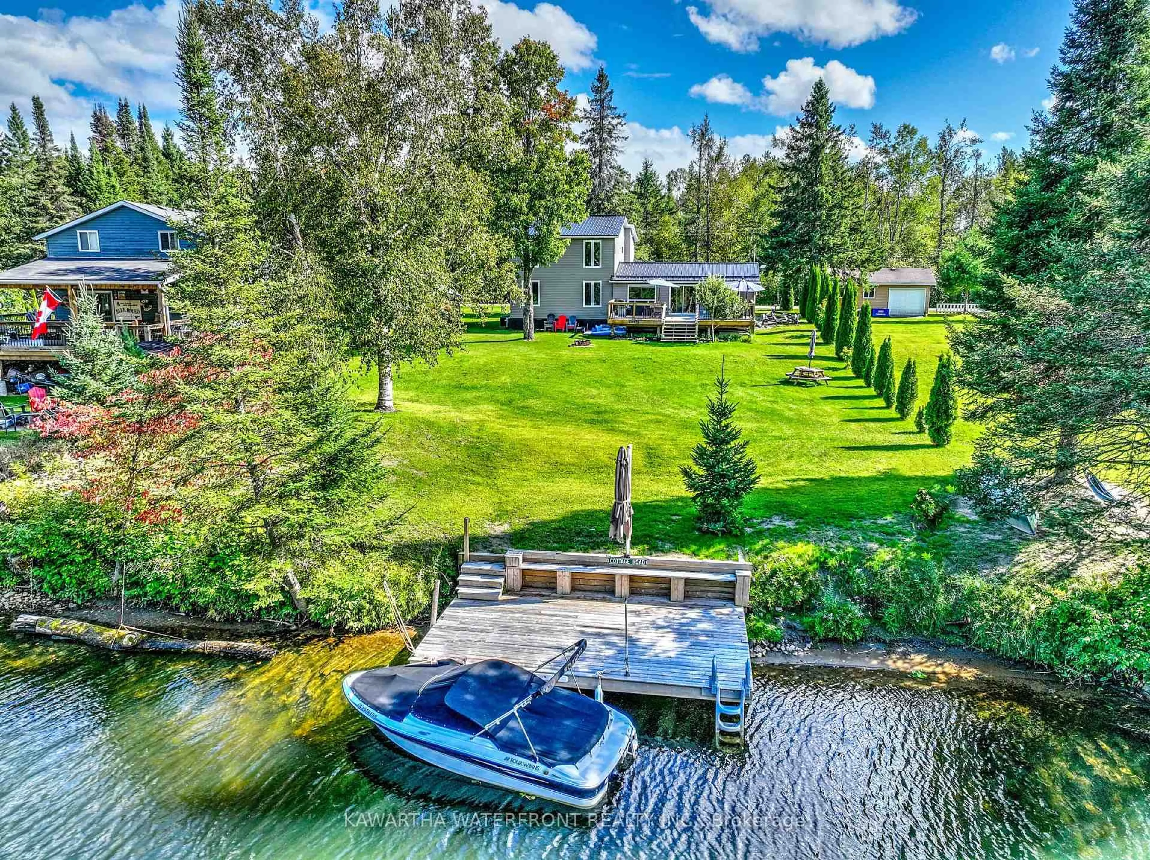 A pic from outside/outdoor area/front of a property/back of a property/a pic from drone, water/lake/river/ocean view for 90 Kozy Kove Rd, Kawartha Lakes Ontario K0M 1C0