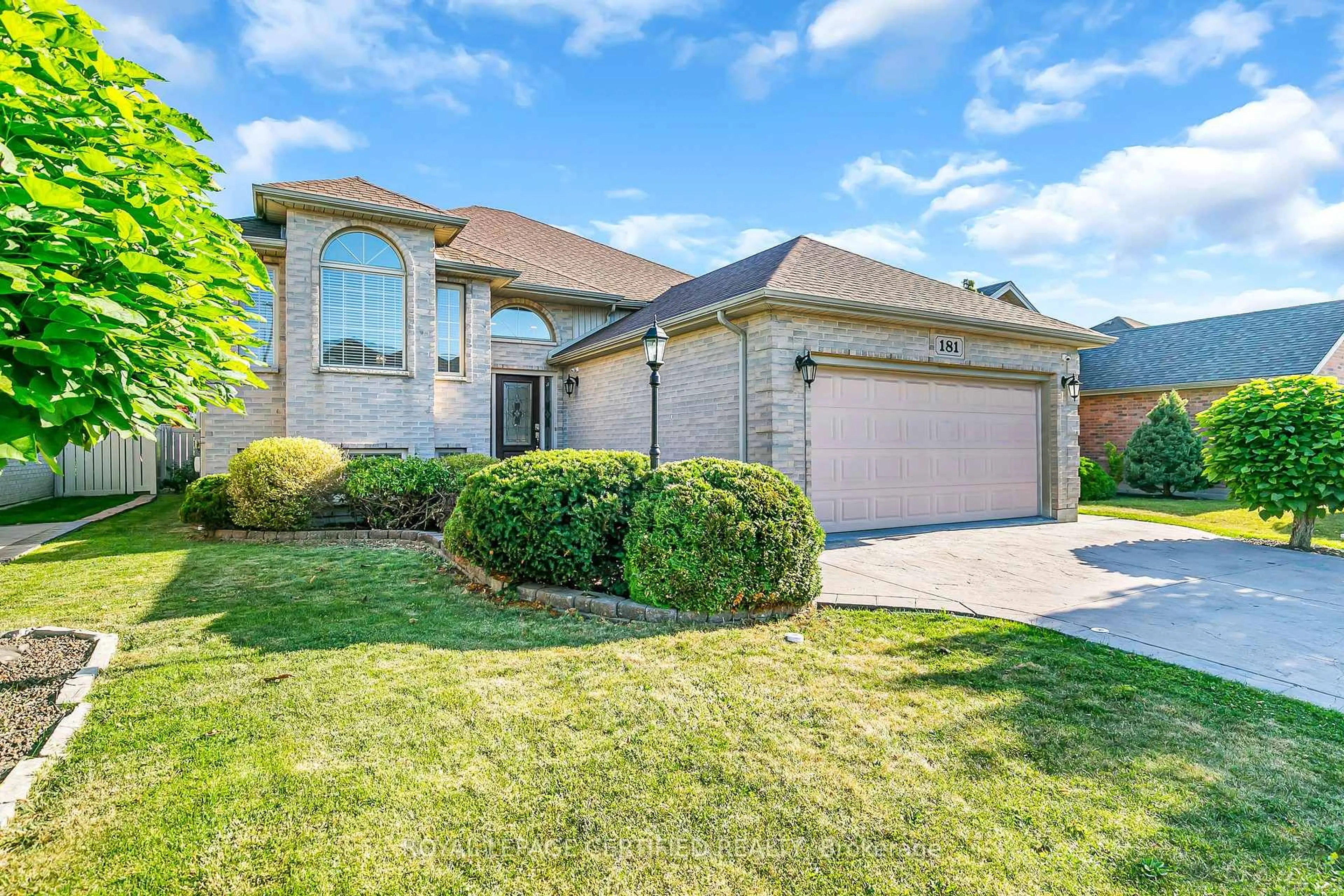 Home with brick exterior material, street for 181 Rockhaven Dr, Lakeshore Ontario N9K 1E9
