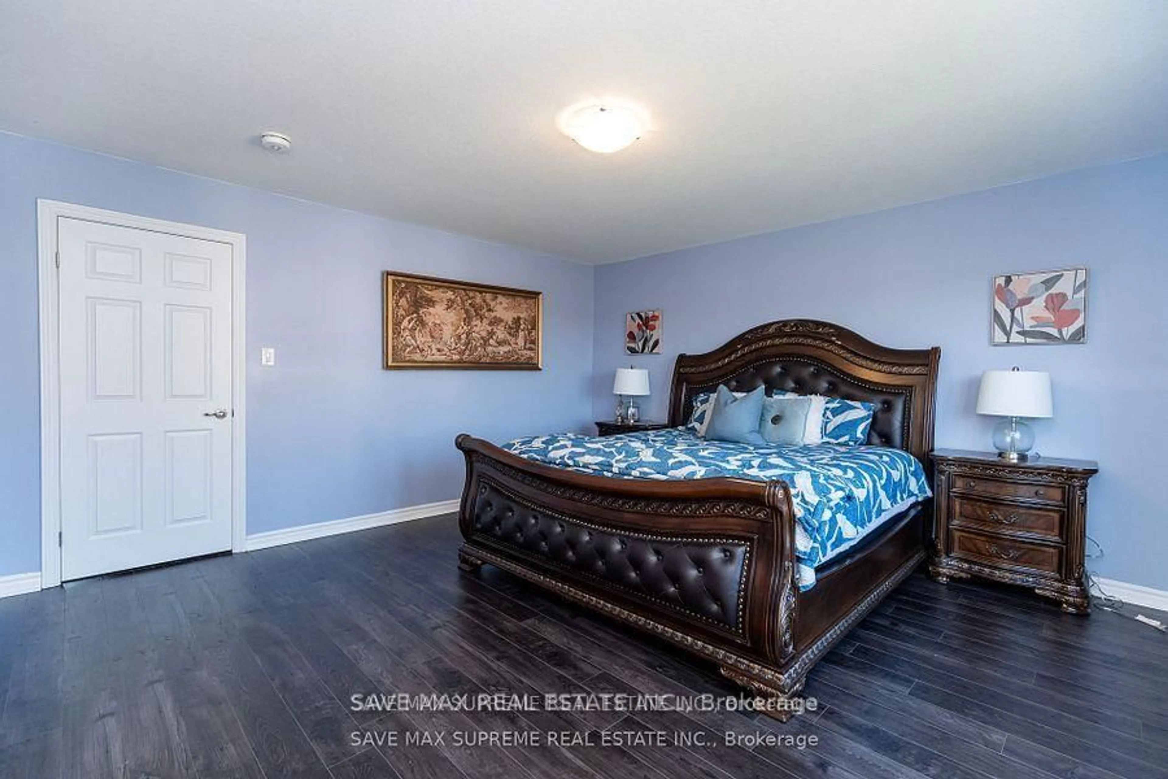Bedroom with bed, wood/laminate floor for 32 Sleeth St, Brantford Ontario N3S 0J7