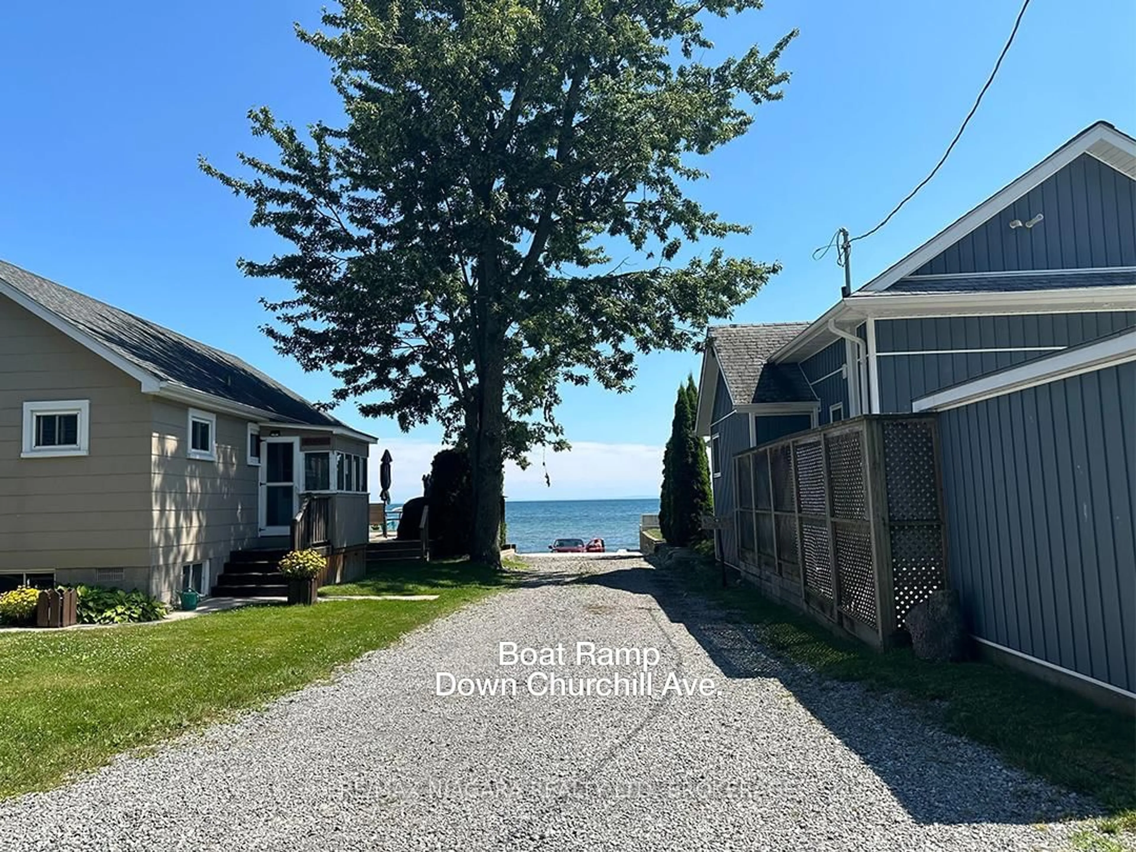 A pic from outside/outdoor area/front of a property/back of a property/a pic from drone, water/lake/river/ocean view for 11161 Churchill Ave, Wainfleet Ontario L0S 1V0