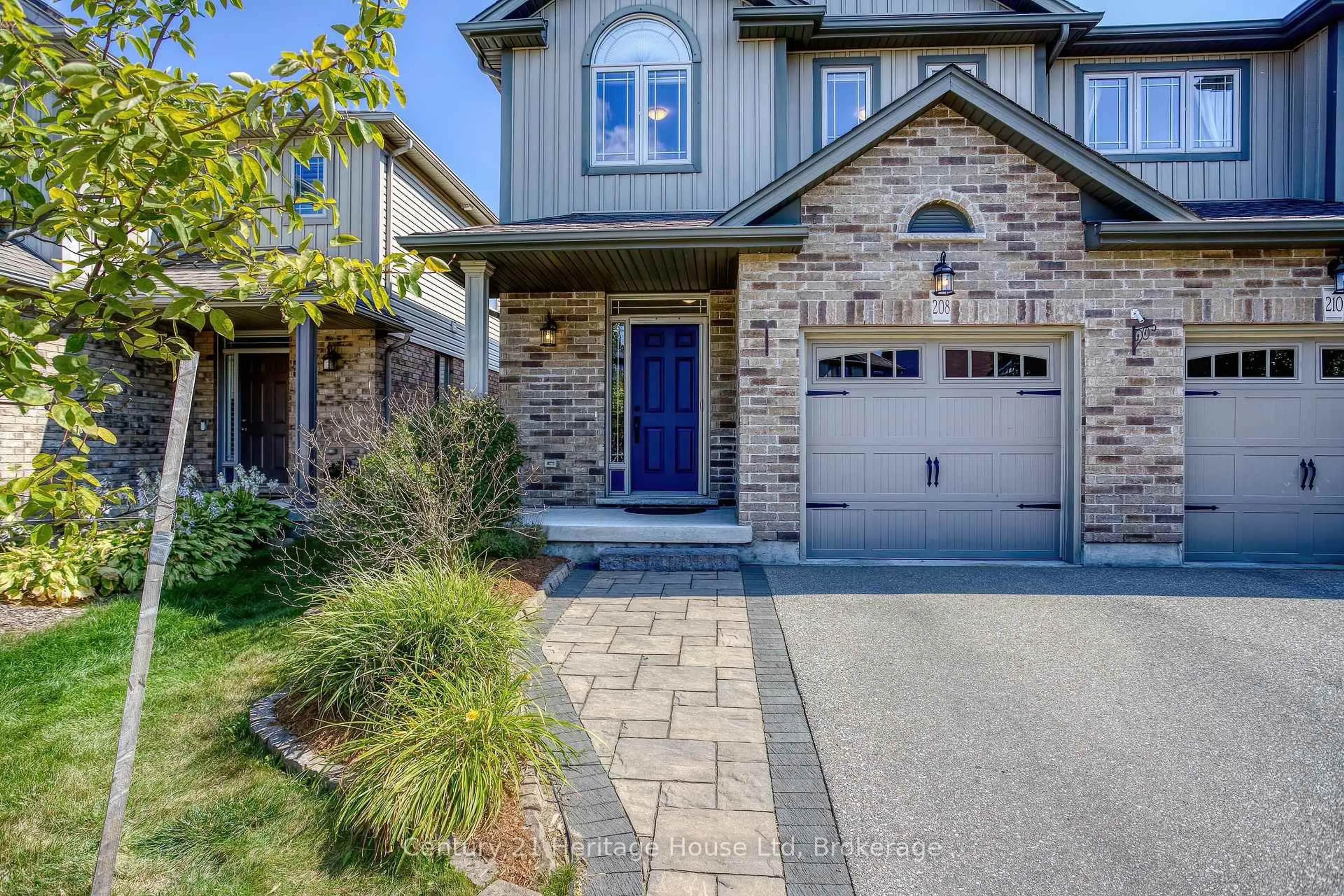 Home with brick exterior material, street for 208 Couling Cres, Guelph Ontario N1E 0L4