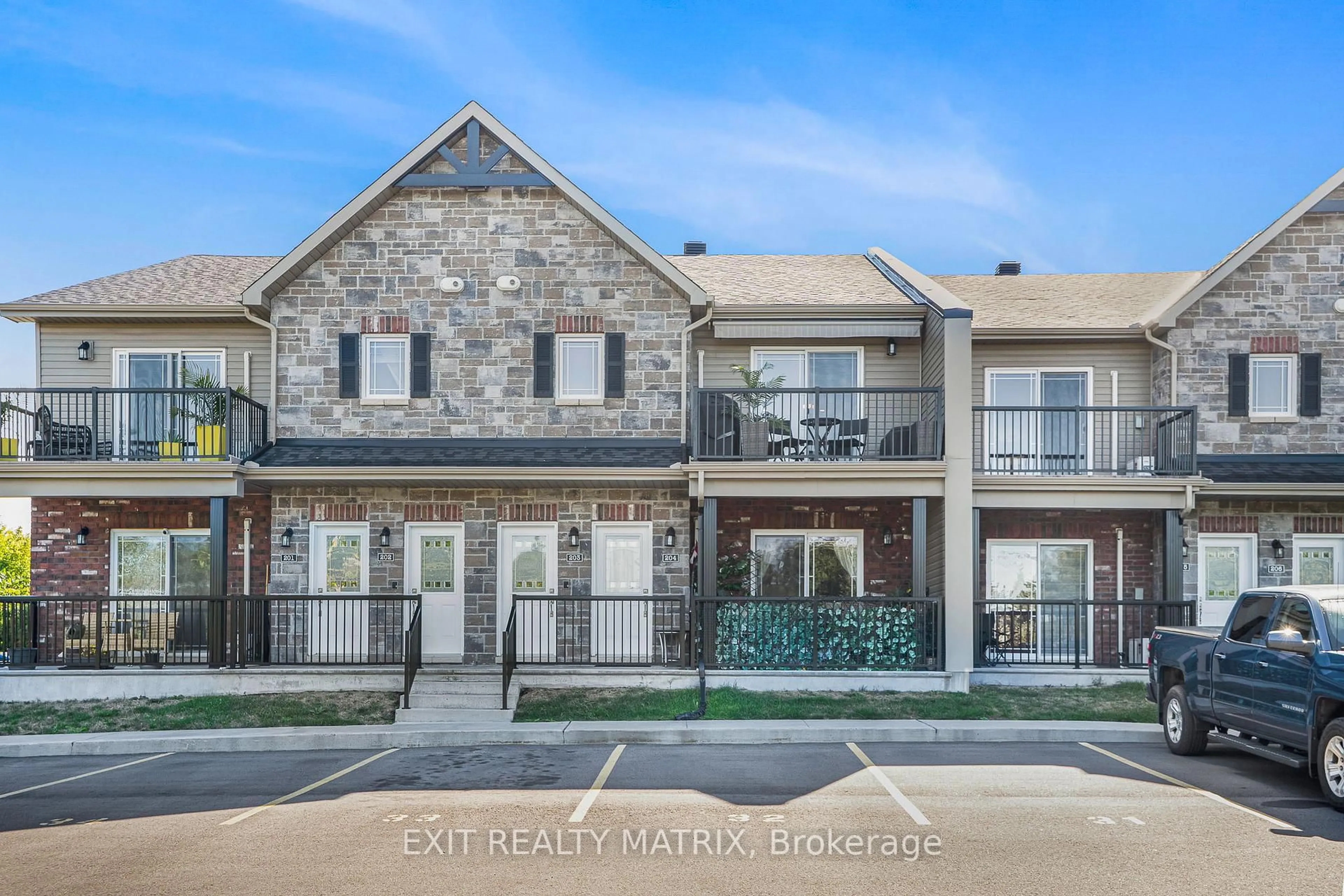 Home with brick exterior material, street for 225 Spence Ave #203, Hawkesbury Ontario K6A 0B5