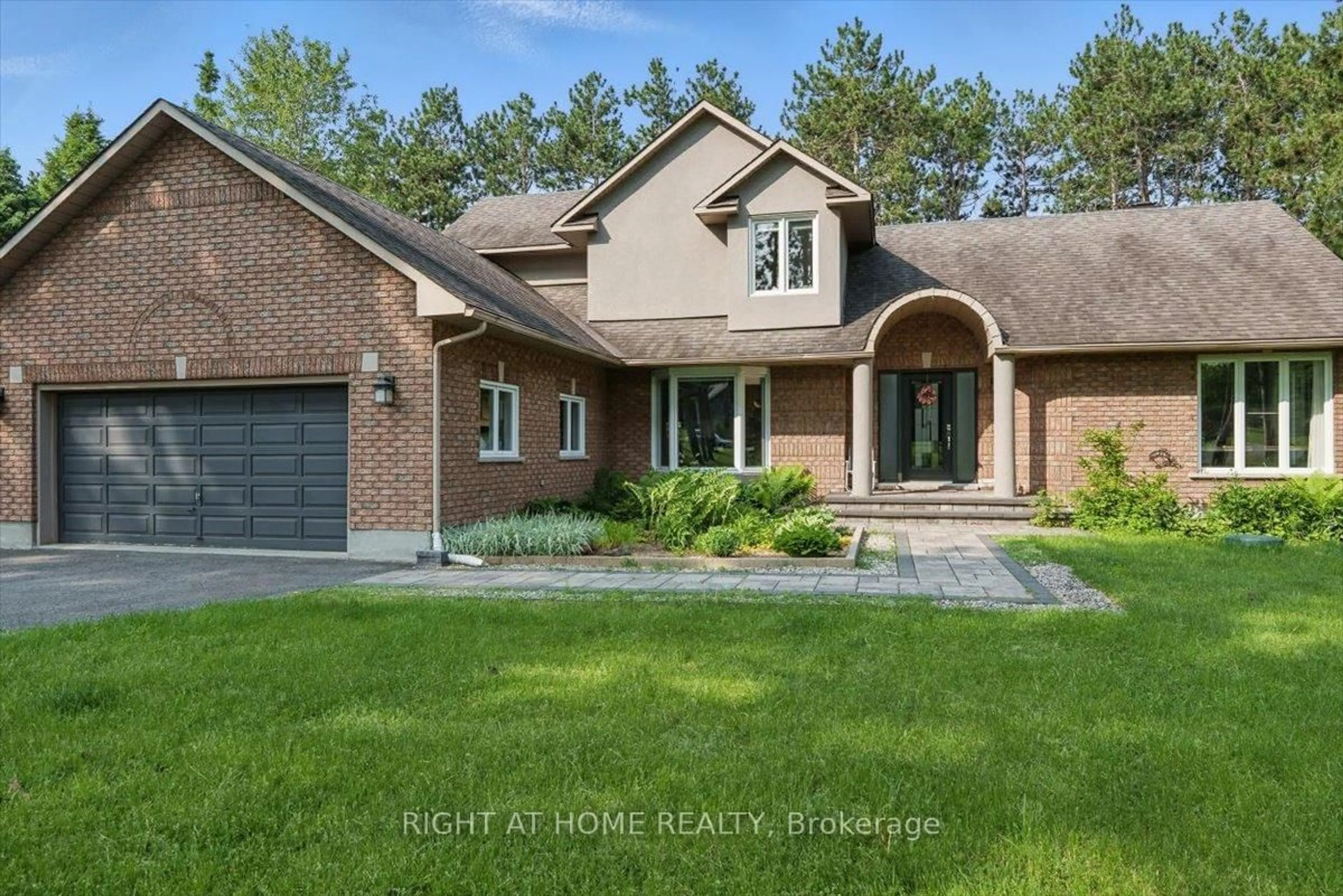 Home with brick exterior material, street for 114 David Kennedy Dr, Ottawa Ontario K0A 1T0
