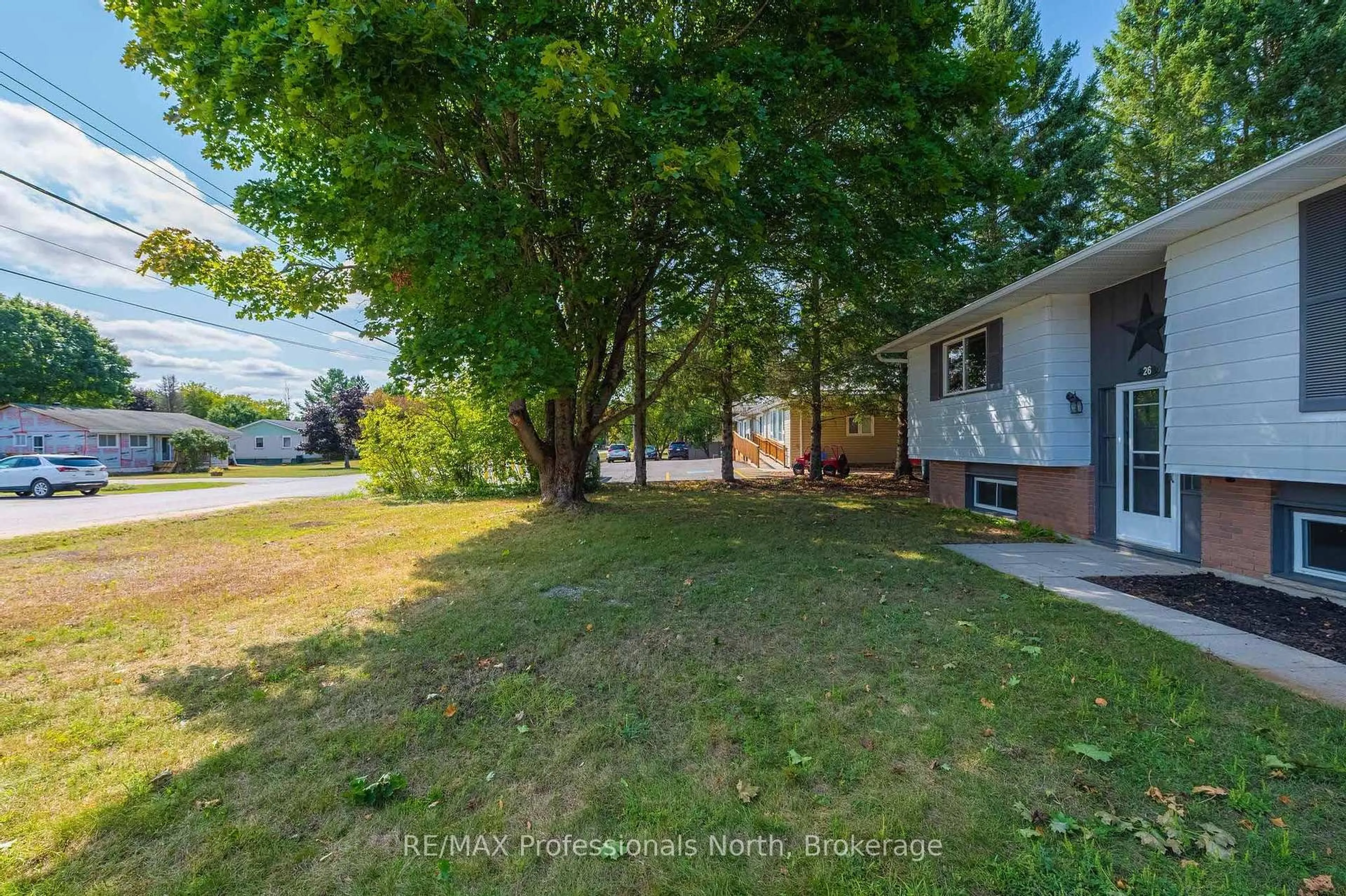 A pic from outside/outdoor area/front of a property/back of a property/a pic from drone, water/lake/river/ocean view for 26 Prentice St, Minden Hills Ontario K0M 2K0