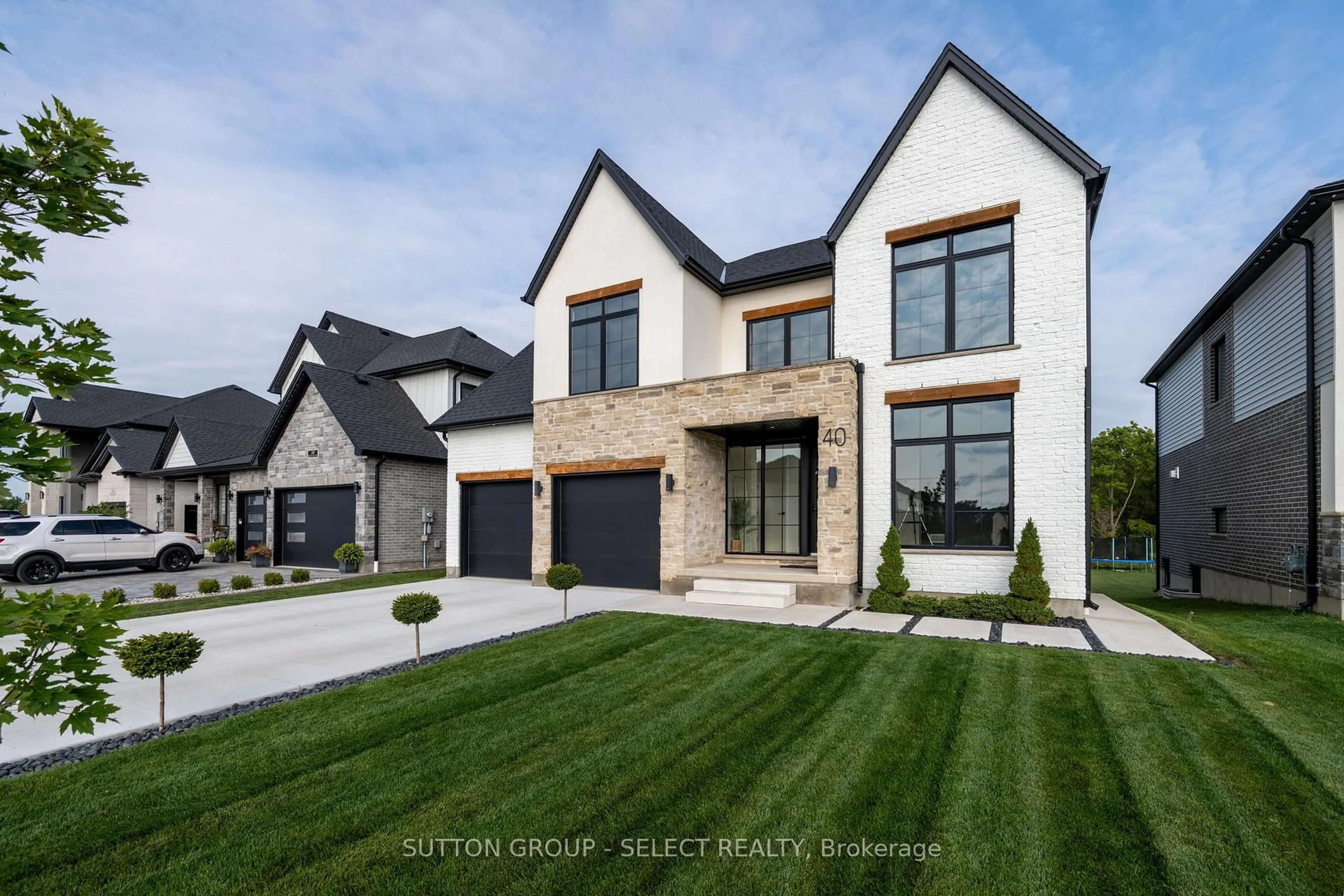 Home with brick exterior material, street for 40 Royal Cres, Southwold Ontario N5P 0G5