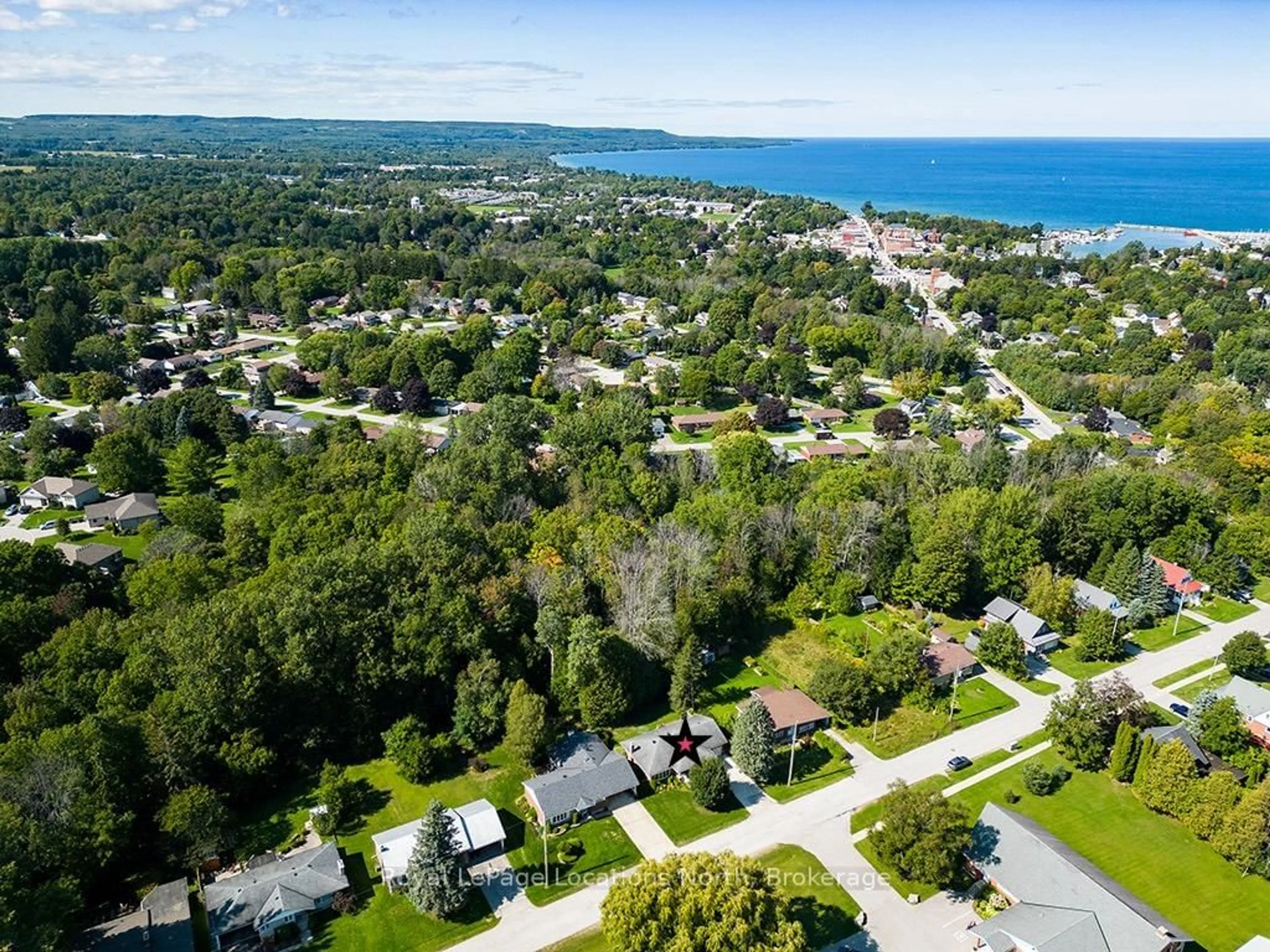 A pic from outside/outdoor area/front of a property/back of a property/a pic from drone, water/lake/river/ocean view for 64 Ivan St, Meaford Ontario N4L 1C8