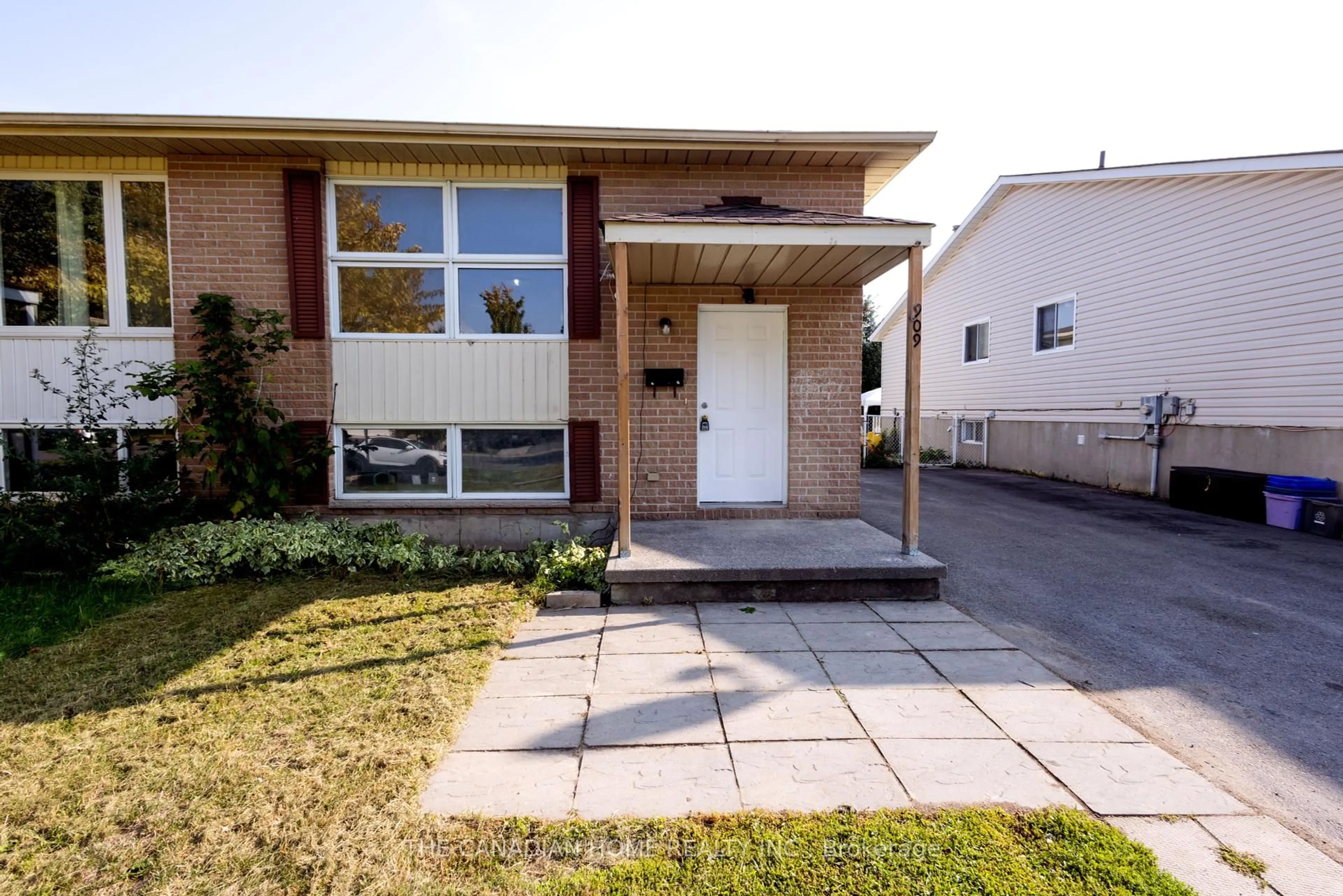 Home with brick exterior material, street for 909 UXBRIDGE Cres, Kingston Ontario K7M 8K8