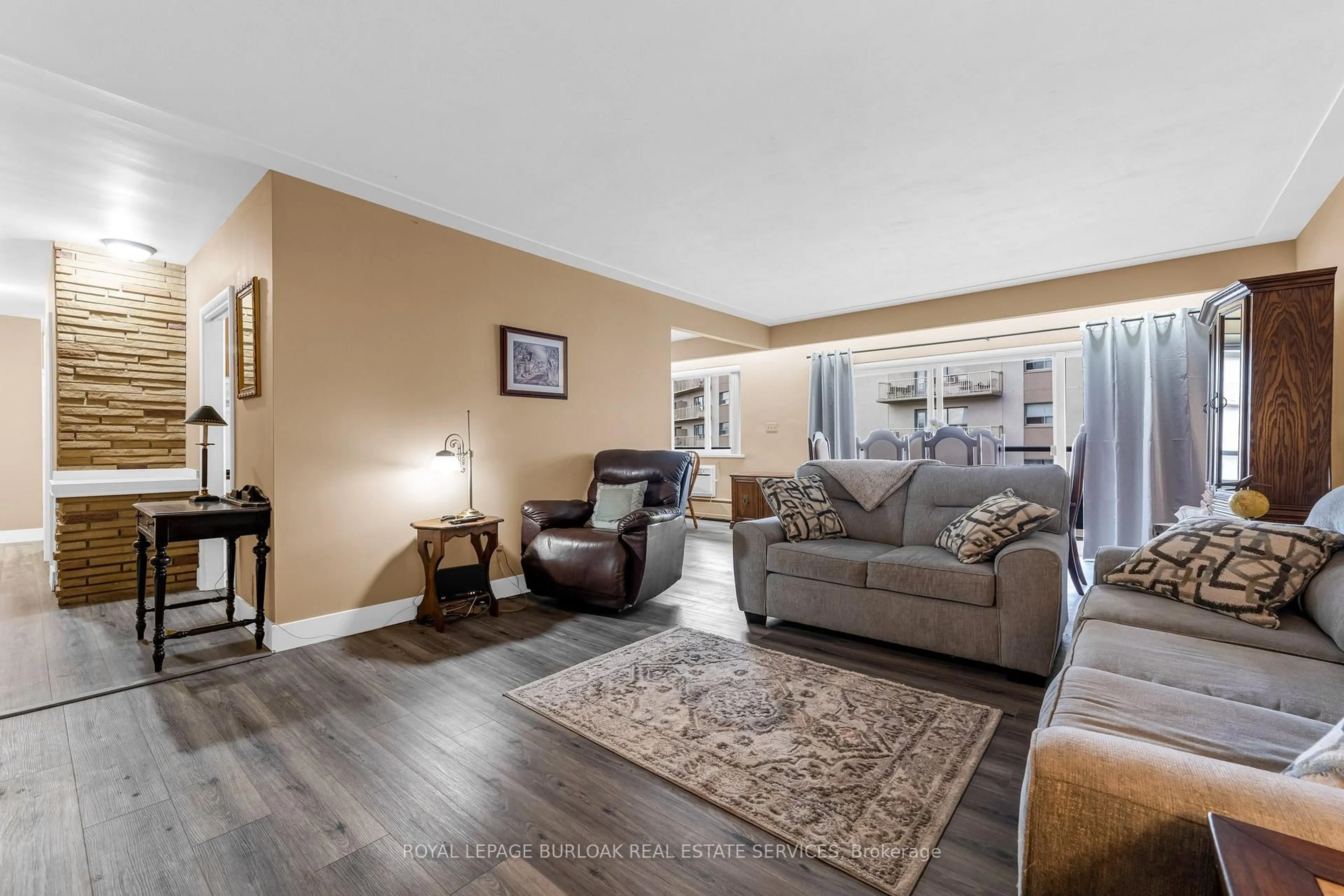 Living room with furniture, unknown for 510 Queenston Rd #306, Hamilton Ontario L8K 1J3