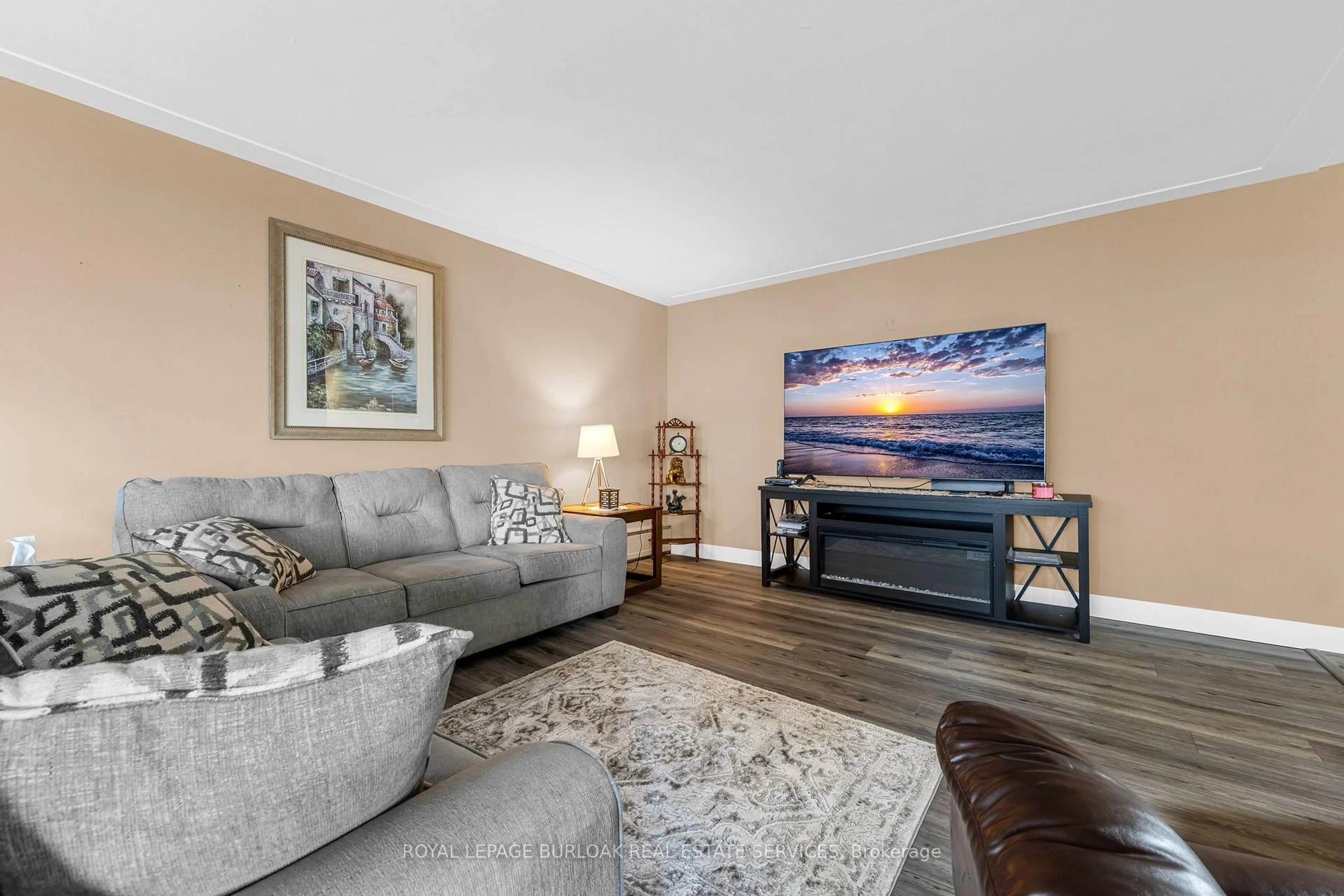 Living room with furniture, unknown for 510 Queenston Rd #306, Hamilton Ontario L8K 1J3
