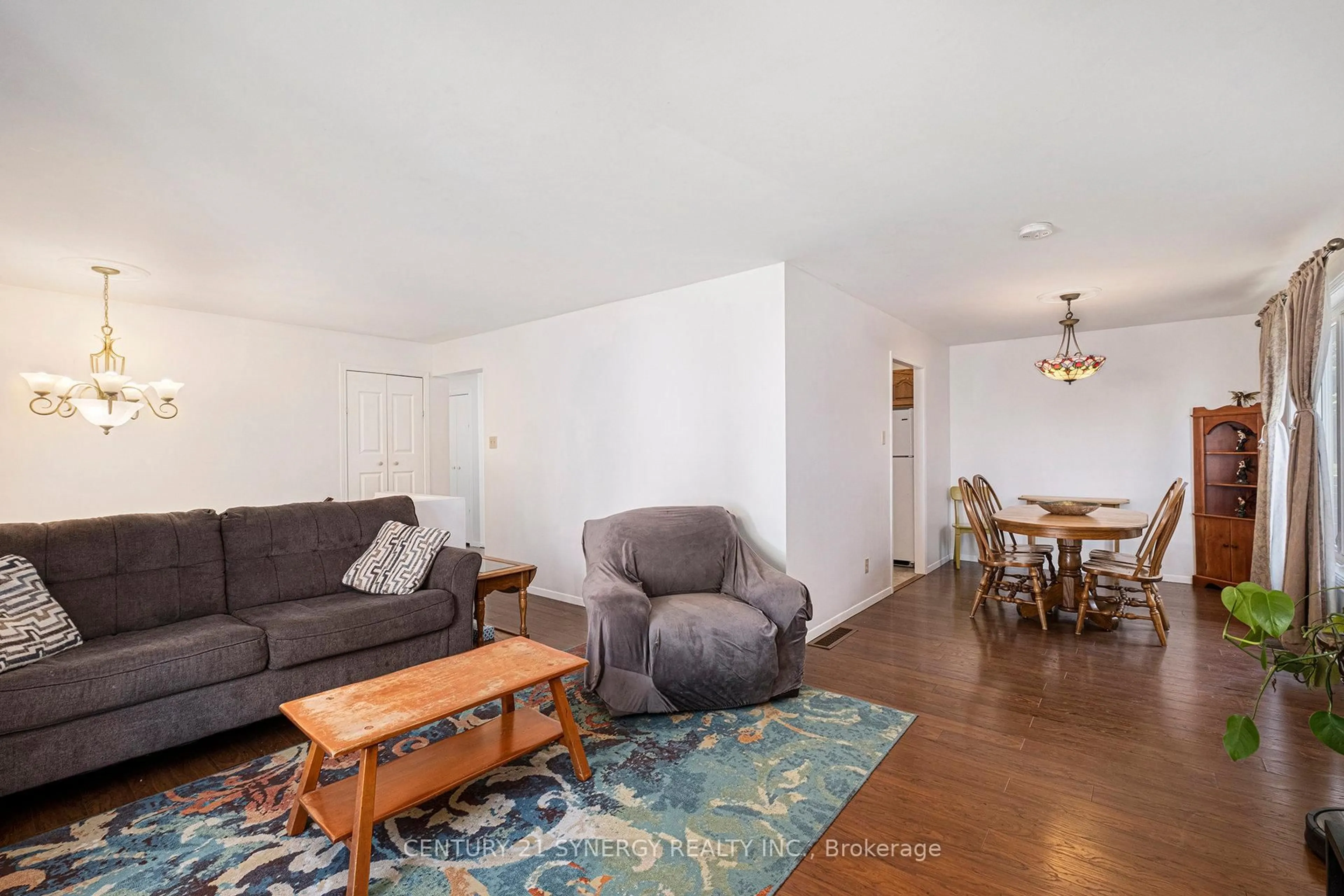 Living room with furniture, wood/laminate floor for 24 Elm St, Smiths Falls Ontario K7A 3S8