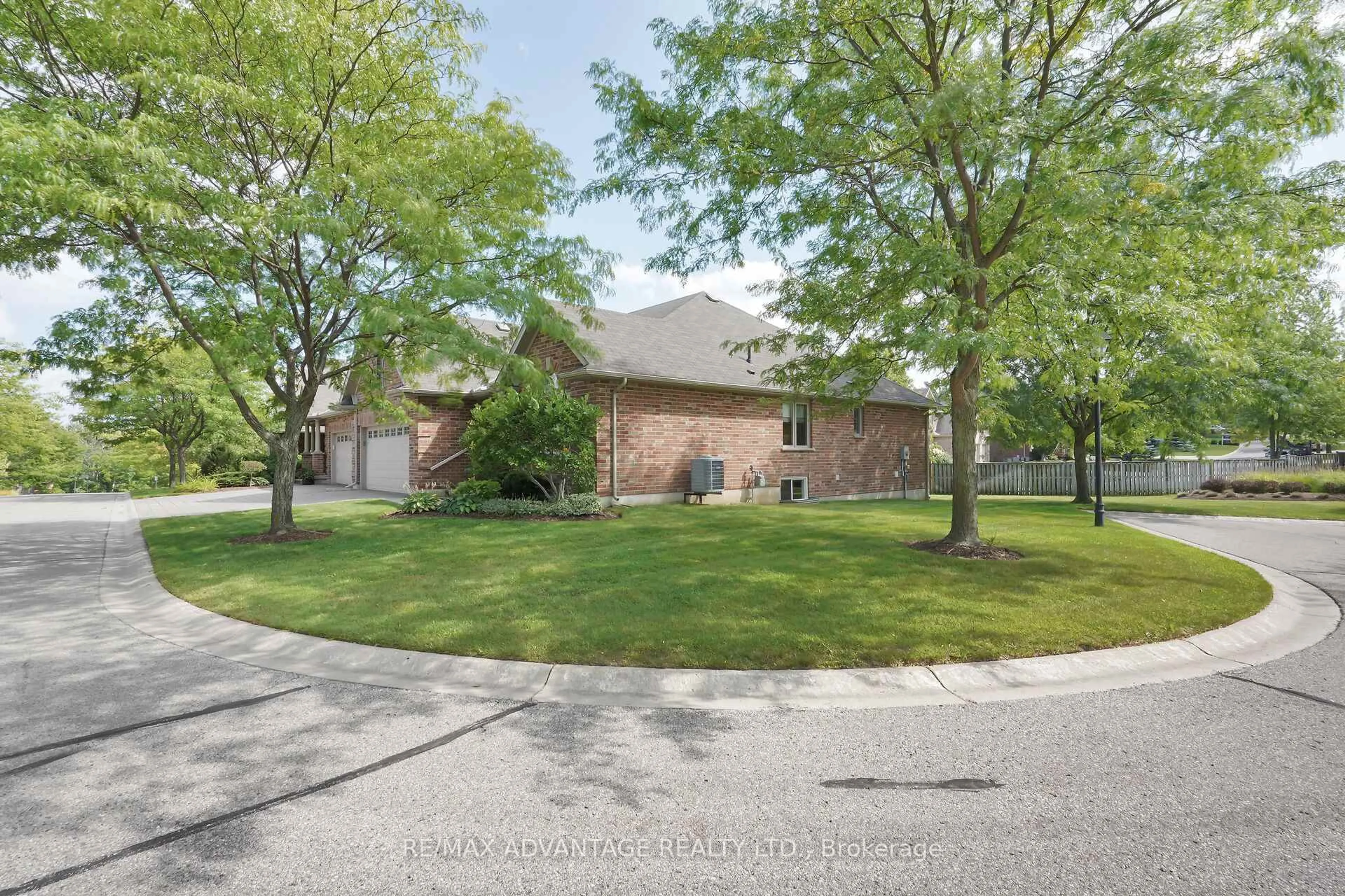 A pic from outside/outdoor area/front of a property/back of a property/a pic from drone, street for 1502 Warbler Woods Walk #42, London South Ontario N6K 0A7