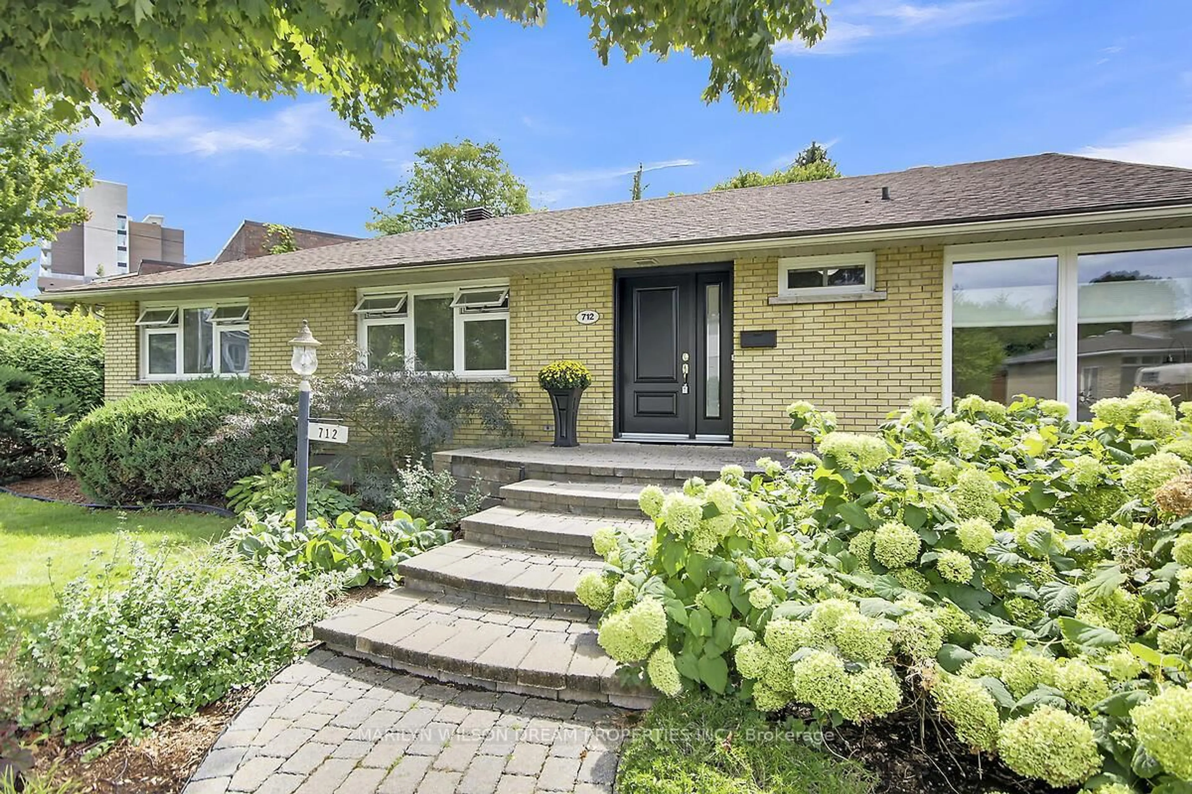 Home with brick exterior material, street for 712 Golden Ave, Ottawa Ontario K2A 2G4