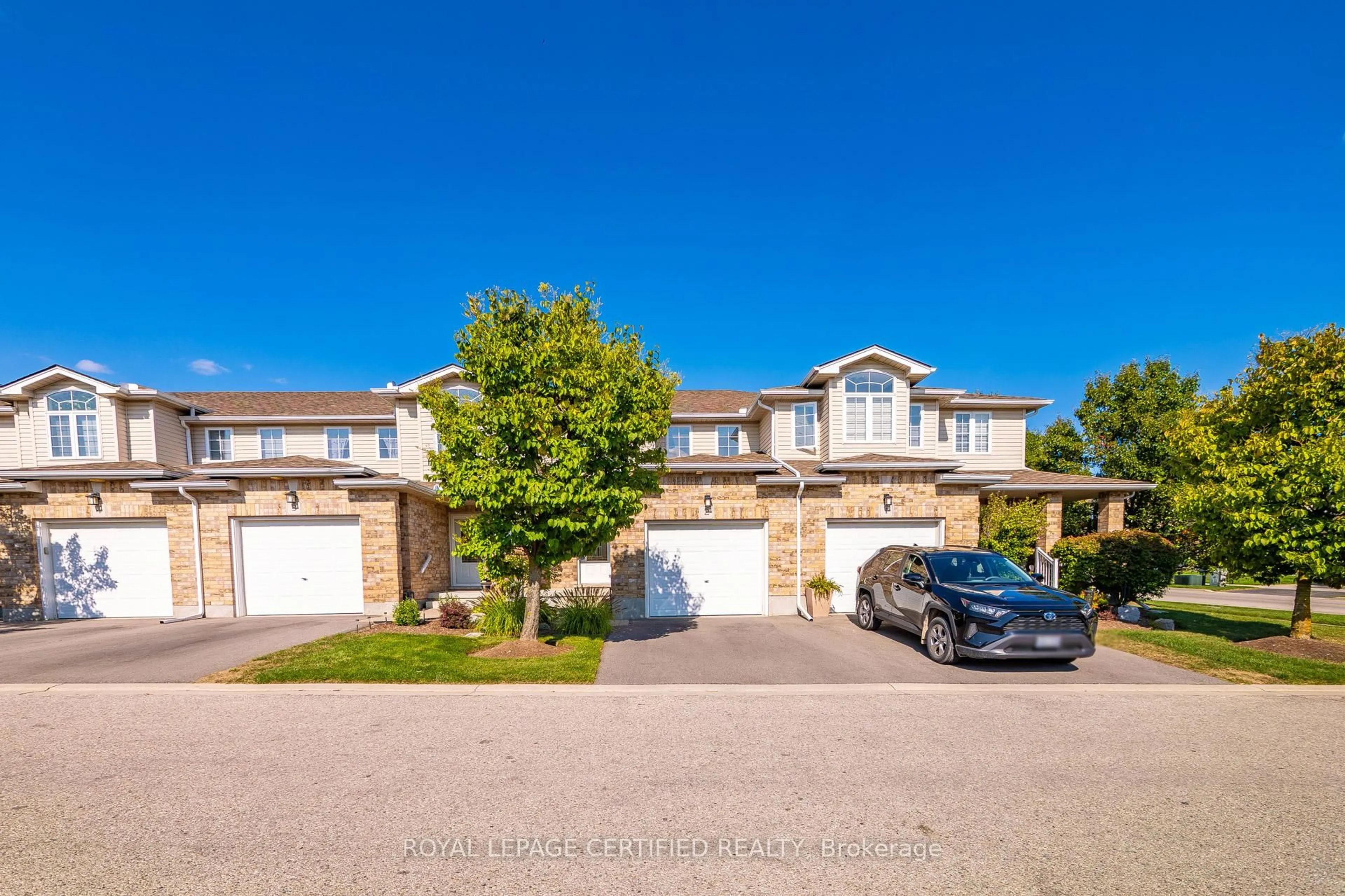A pic from outside/outdoor area/front of a property/back of a property/a pic from drone, street for 20 Shackleton Dr #2, Guelph Ontario N1E 0L5